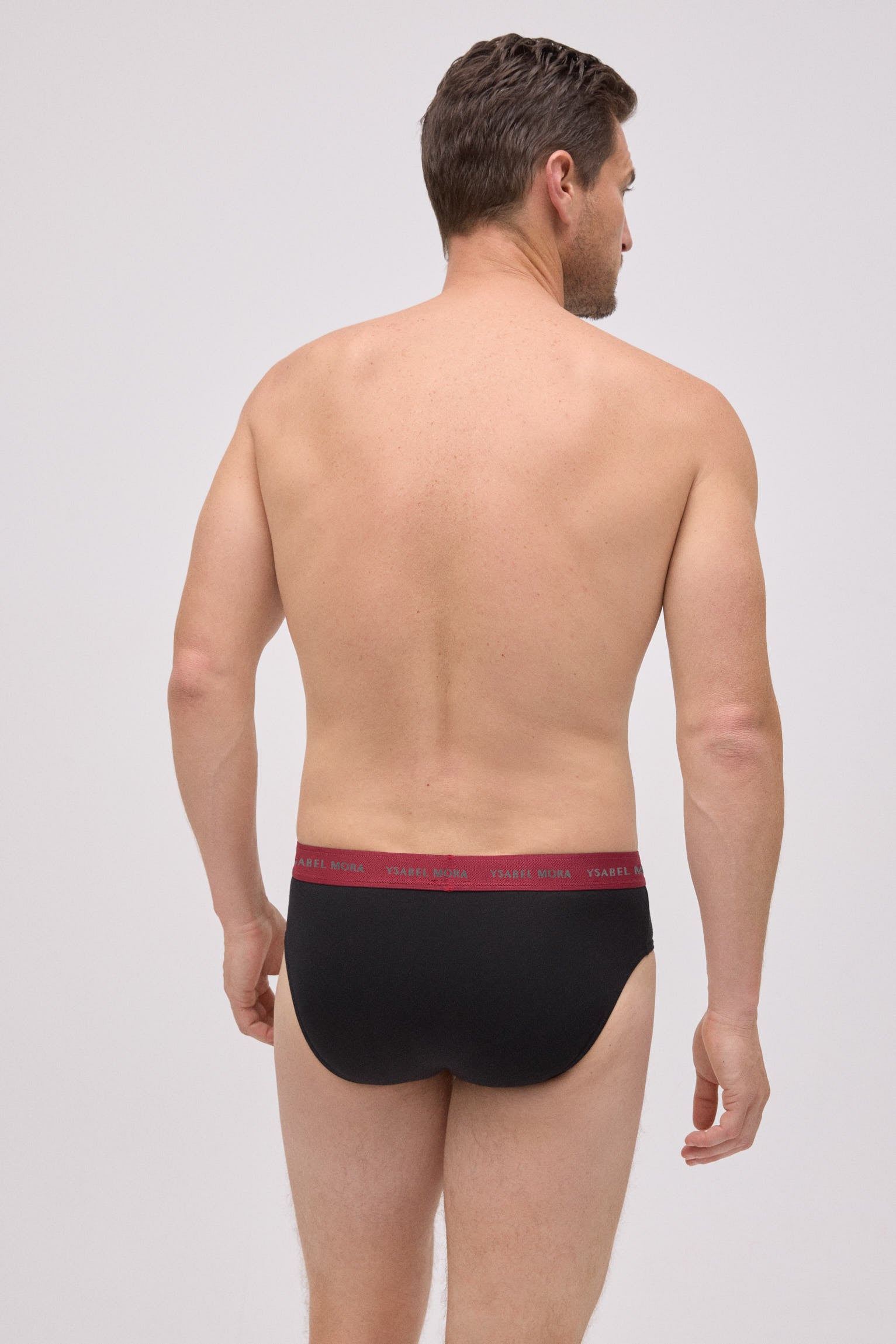 Pack of 6 basic black briefs with a colored band