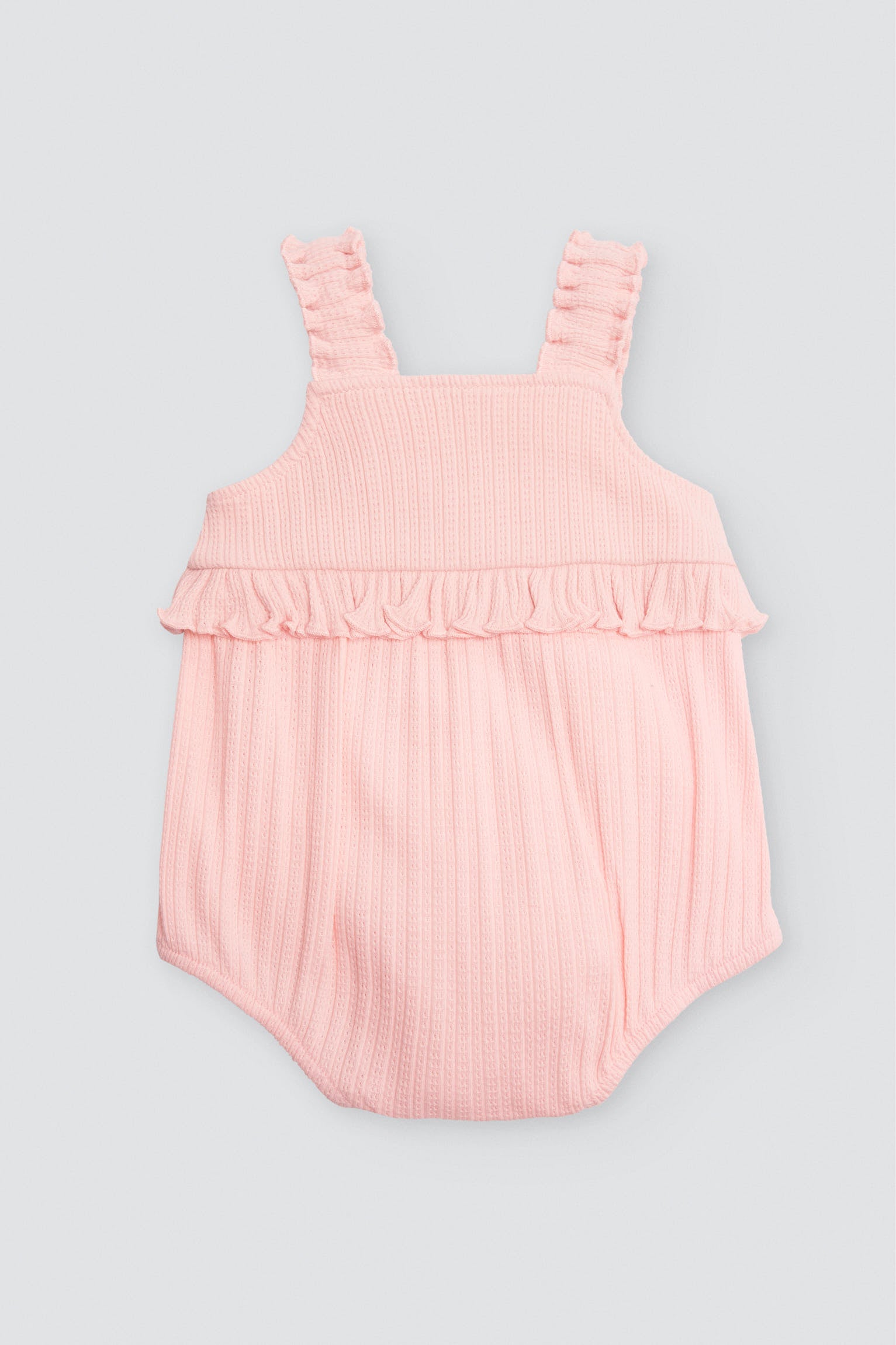 Peto bebé sin mangas detalle volante - Ysabel Mora