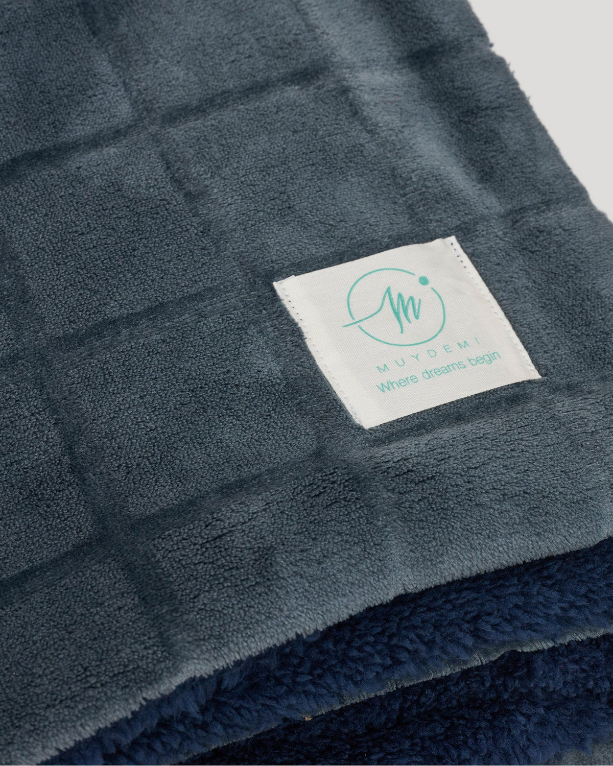 Textured checked coral fleece and shearling blanket