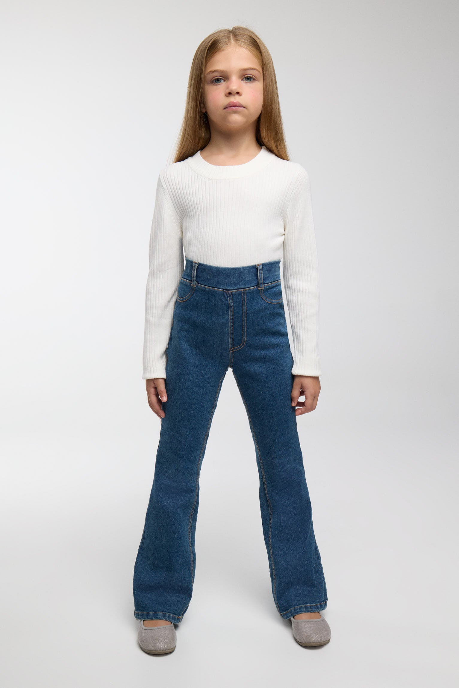 Girls' flared denim-effect trousers