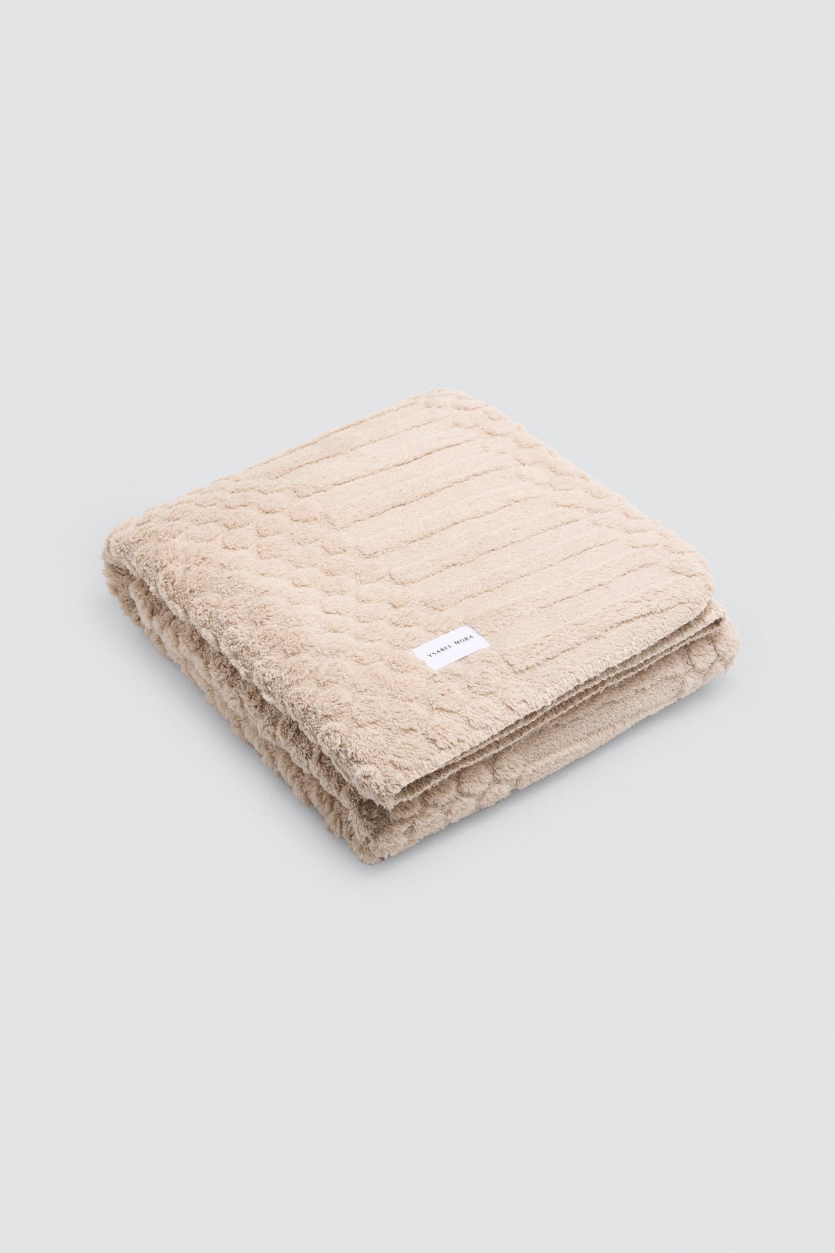 Manta texturizada estampada beige