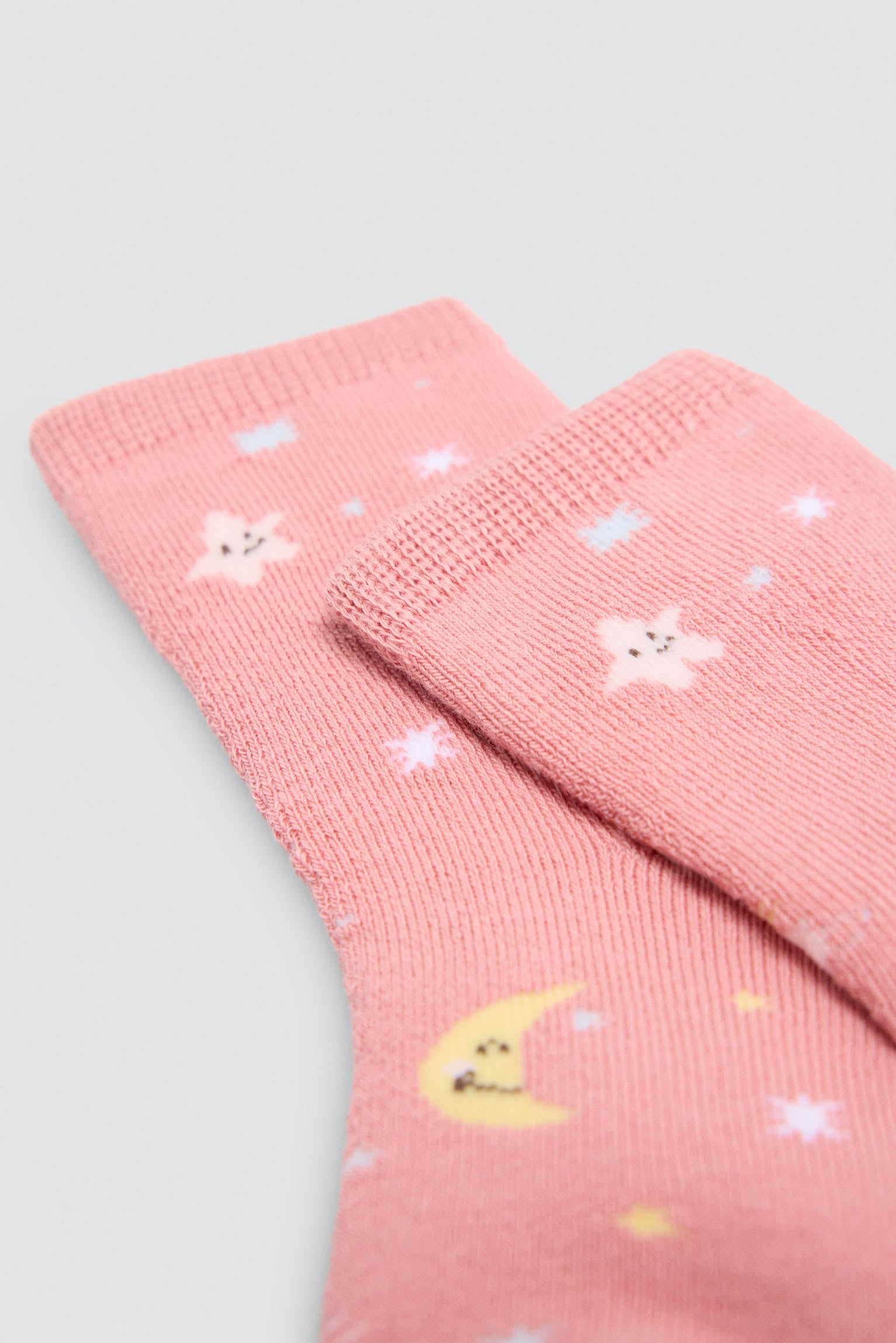 Pack of 4 baby thermal socks with moon and star prints