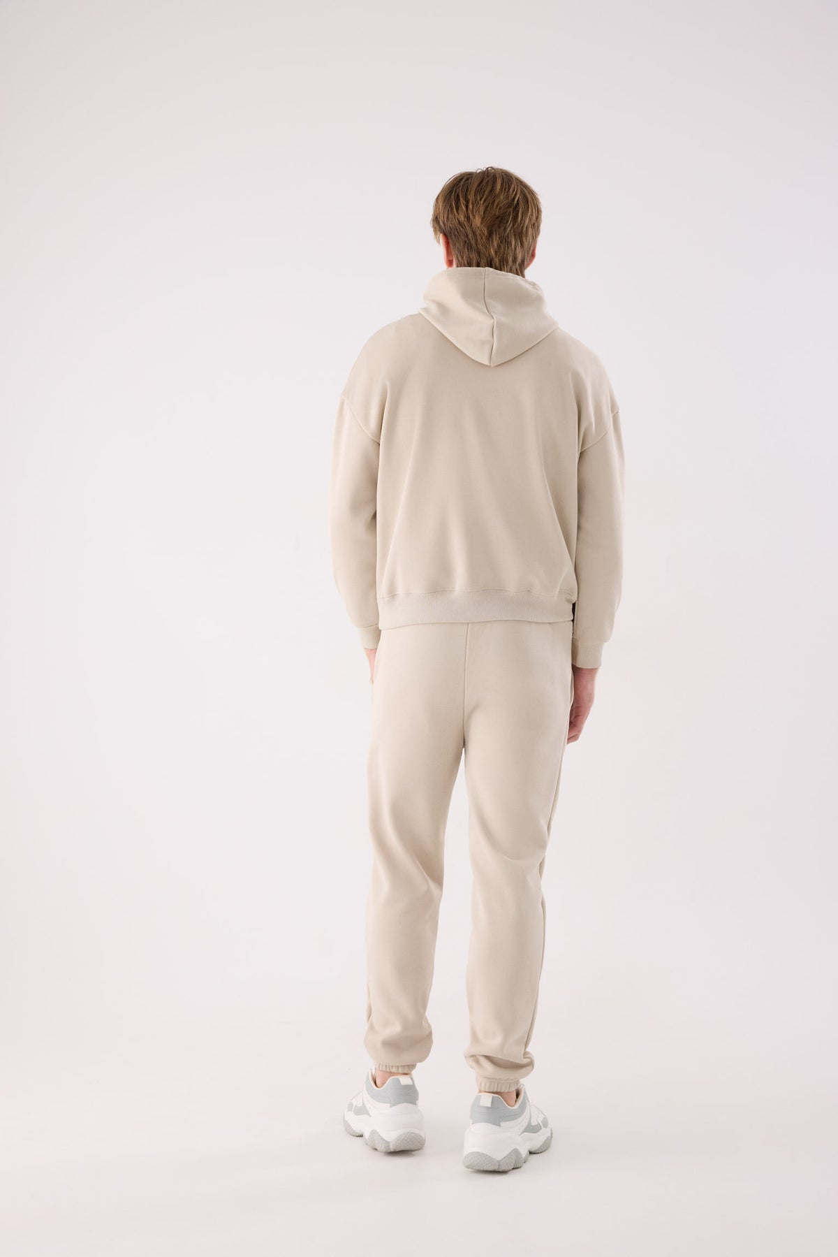 Men's beige fleece joggers with adjustable waist