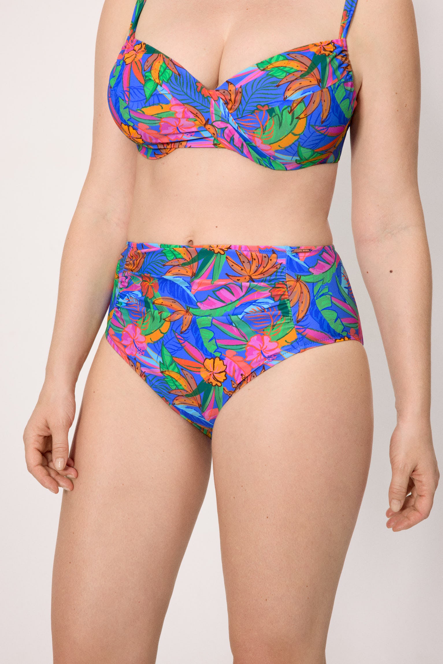 High-waisted bikini bottoms with tropical print