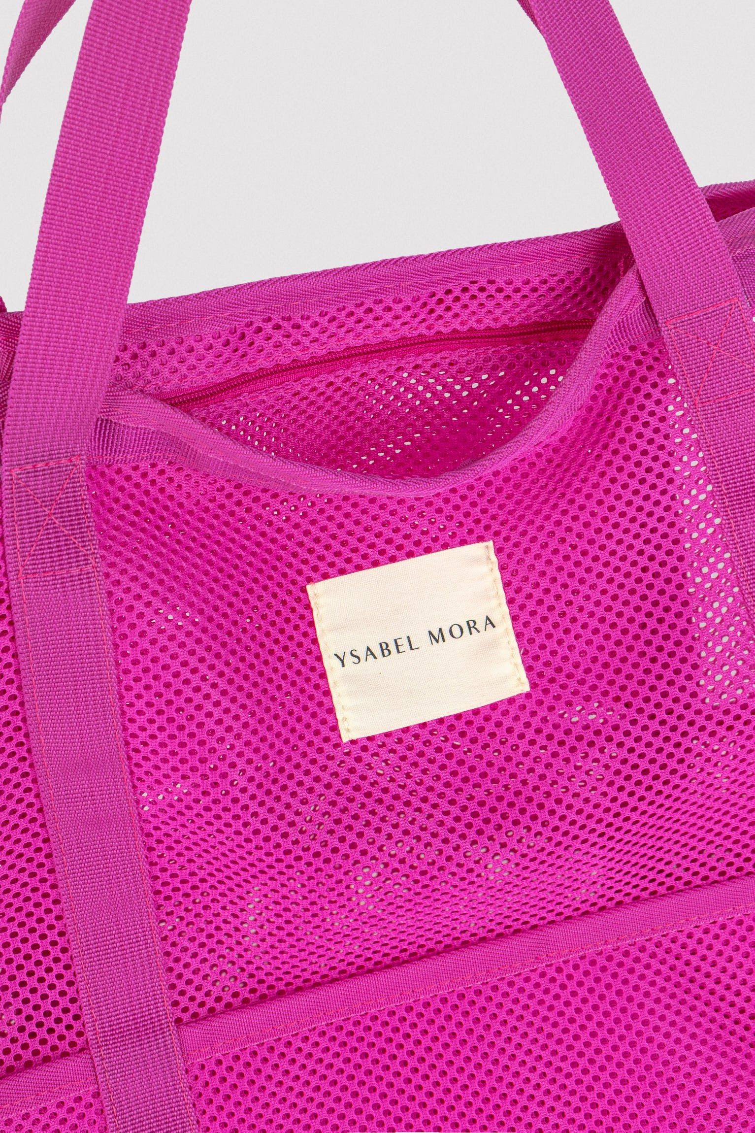 86292-electric-pink-bolsa-de-playa-calada-rosa-ysabel-mora