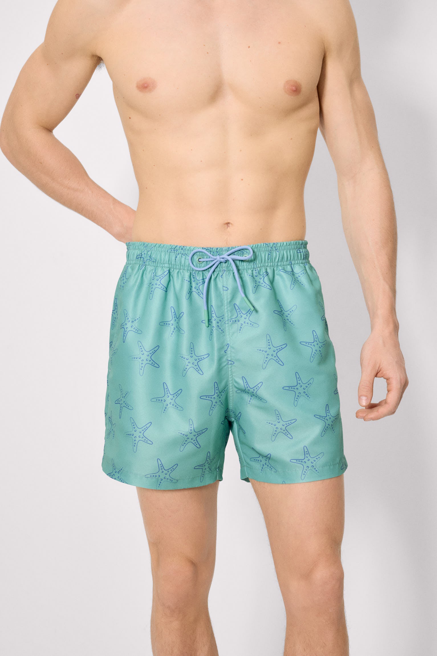 Half swimsuit with green starfish print