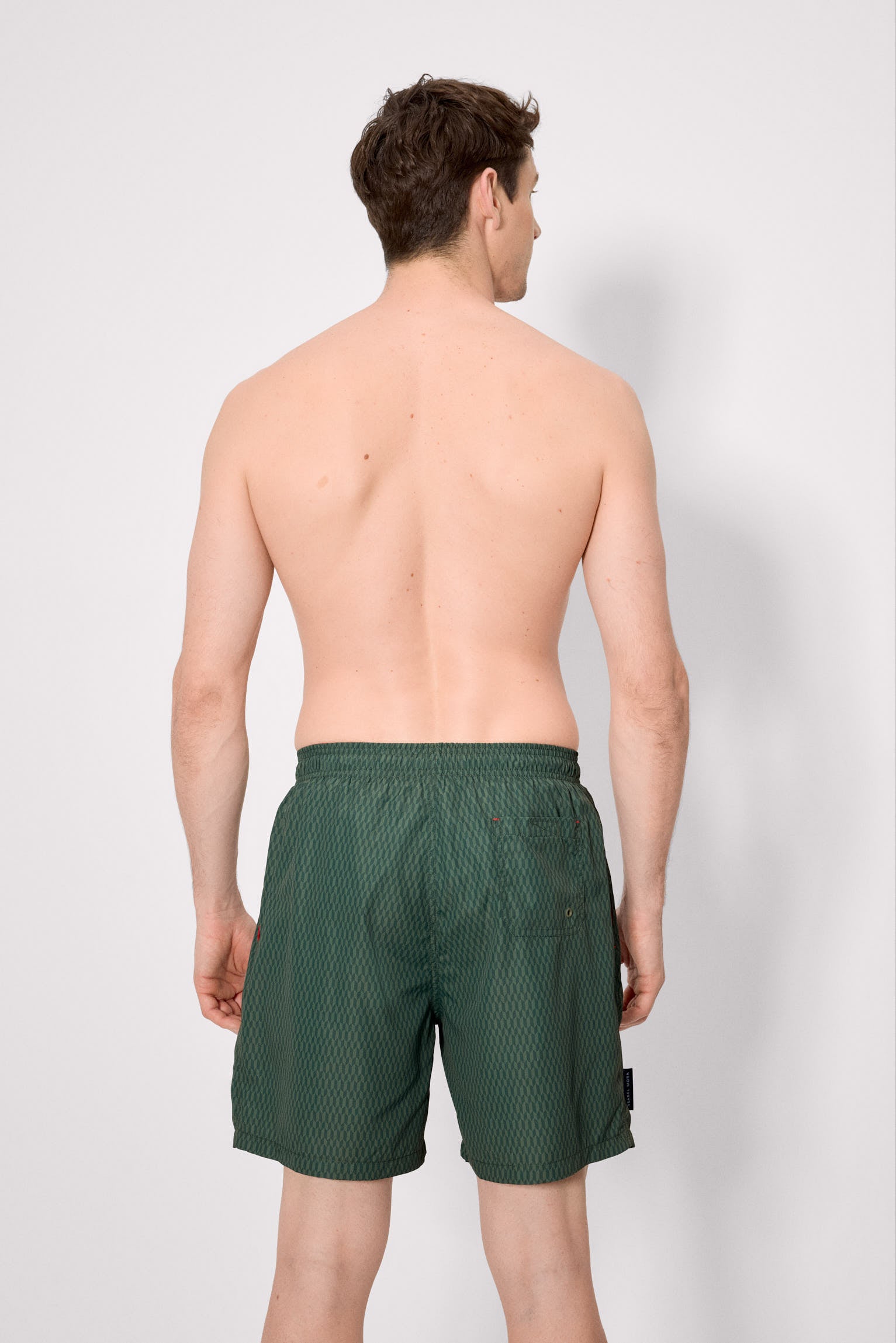 Long swimsuit with green ethnic print