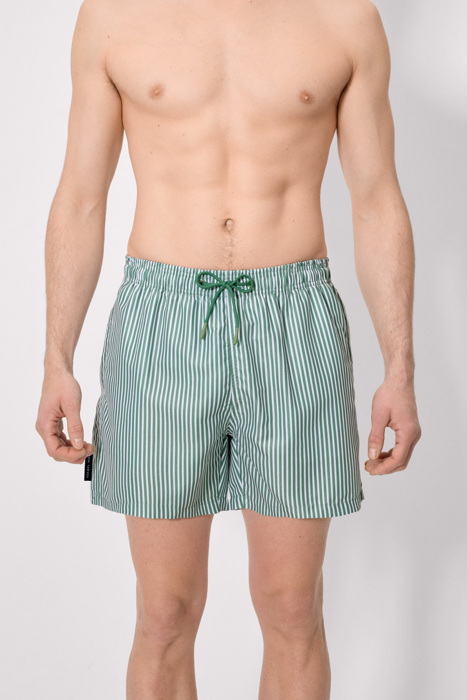 Medium-length swimsuit with green striped print