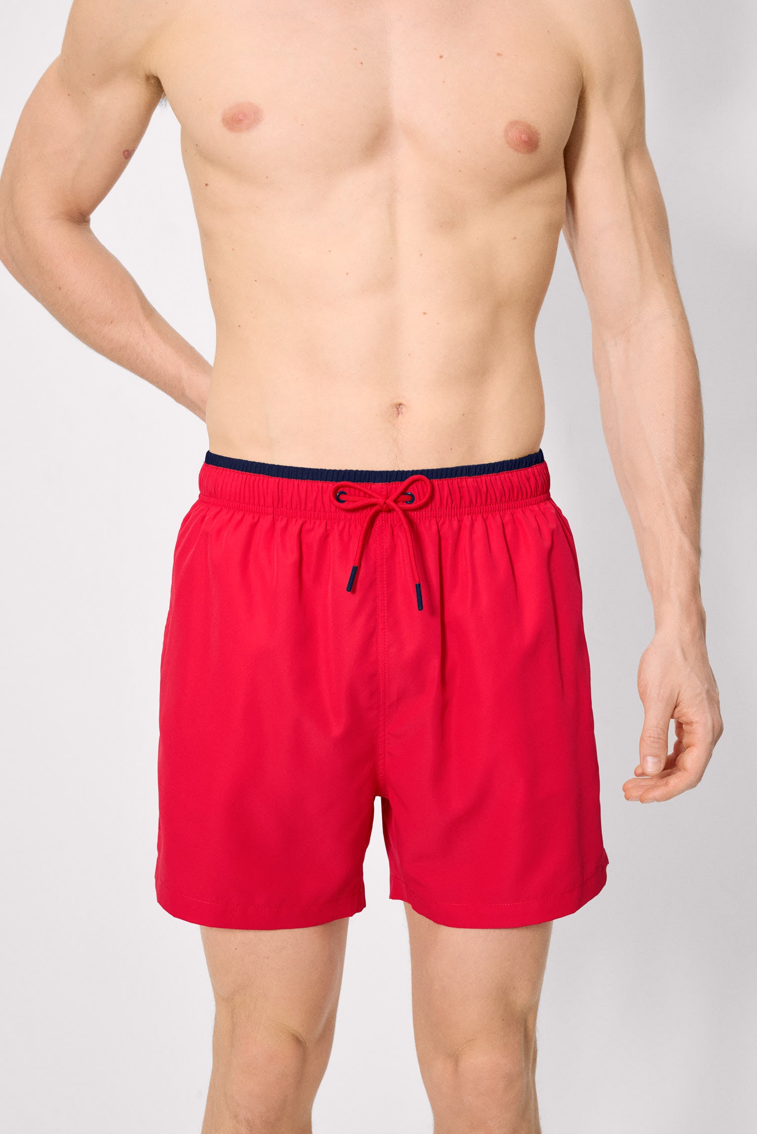 Half swimsuit with red waist detail