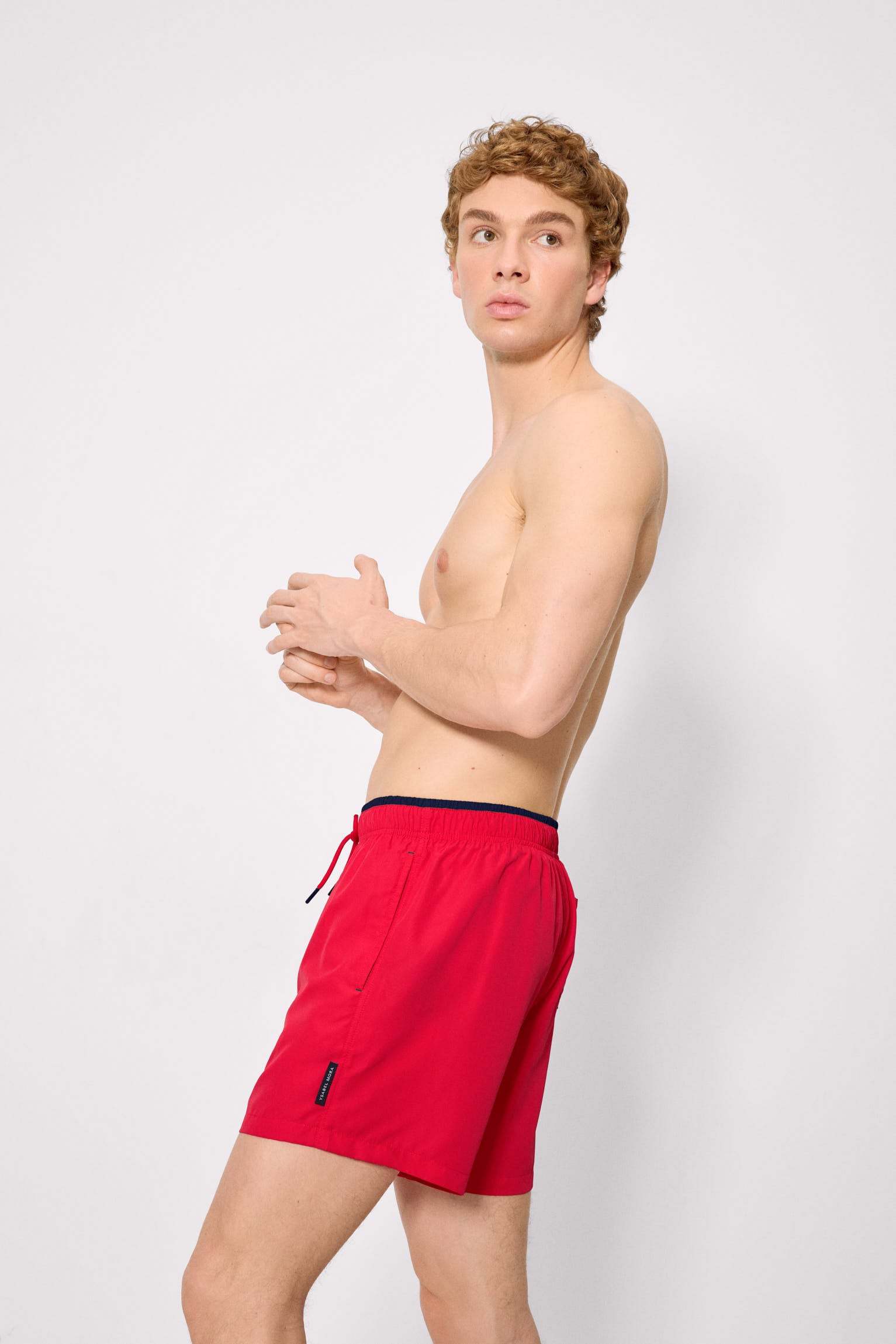 Half swimsuit with red waist detail