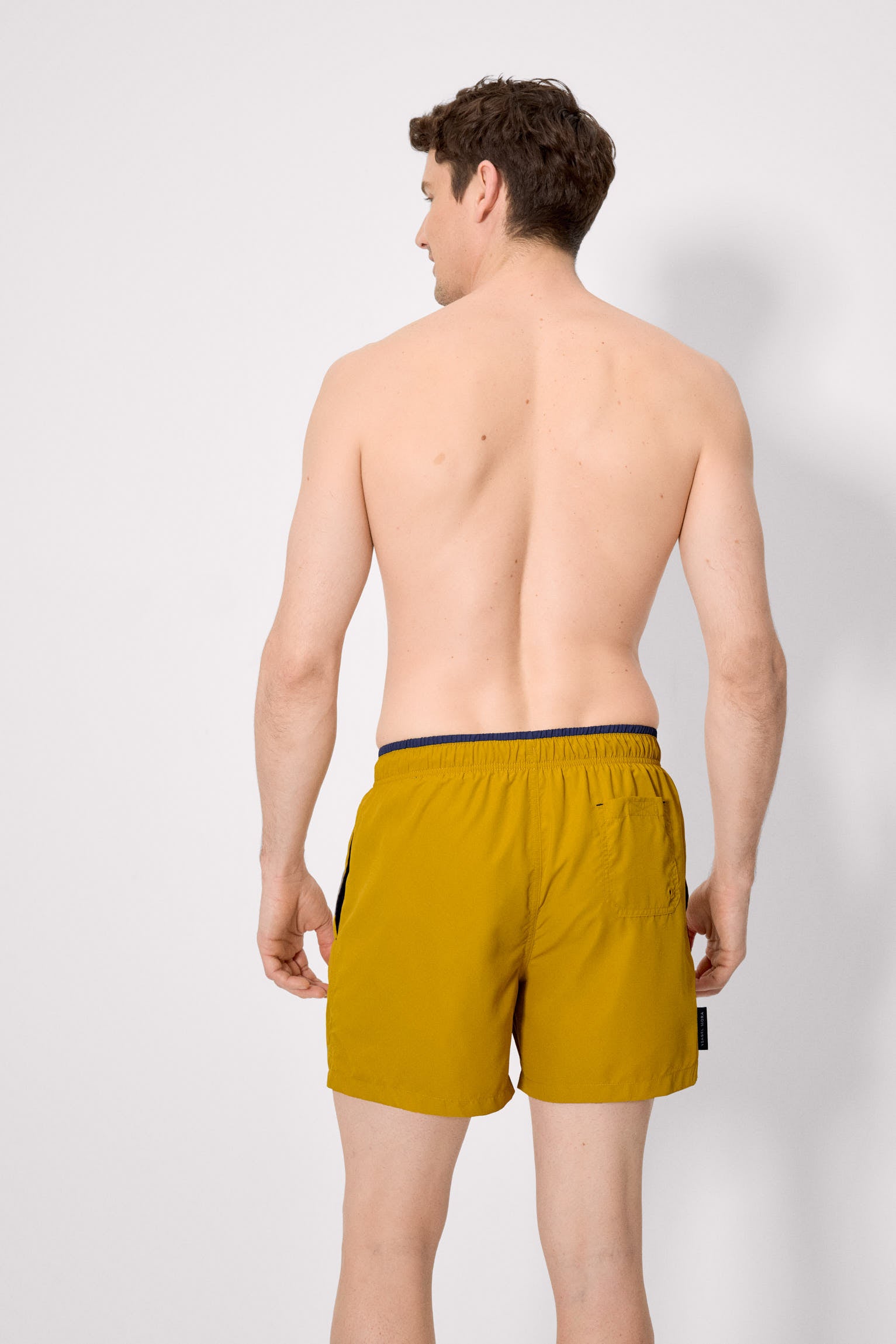Half swimsuit with mustard waist detail
