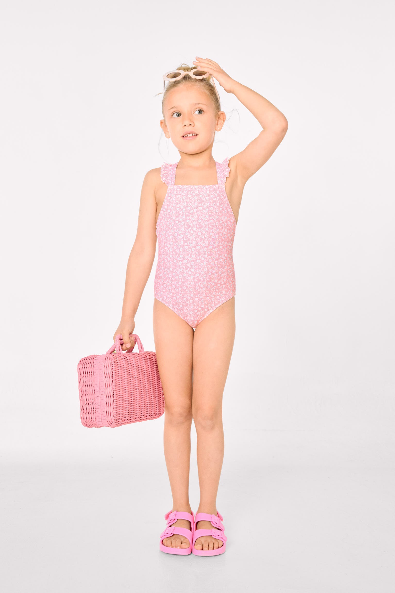 Girls' swimsuit with ruffle details and crossed straps, pink leopard print