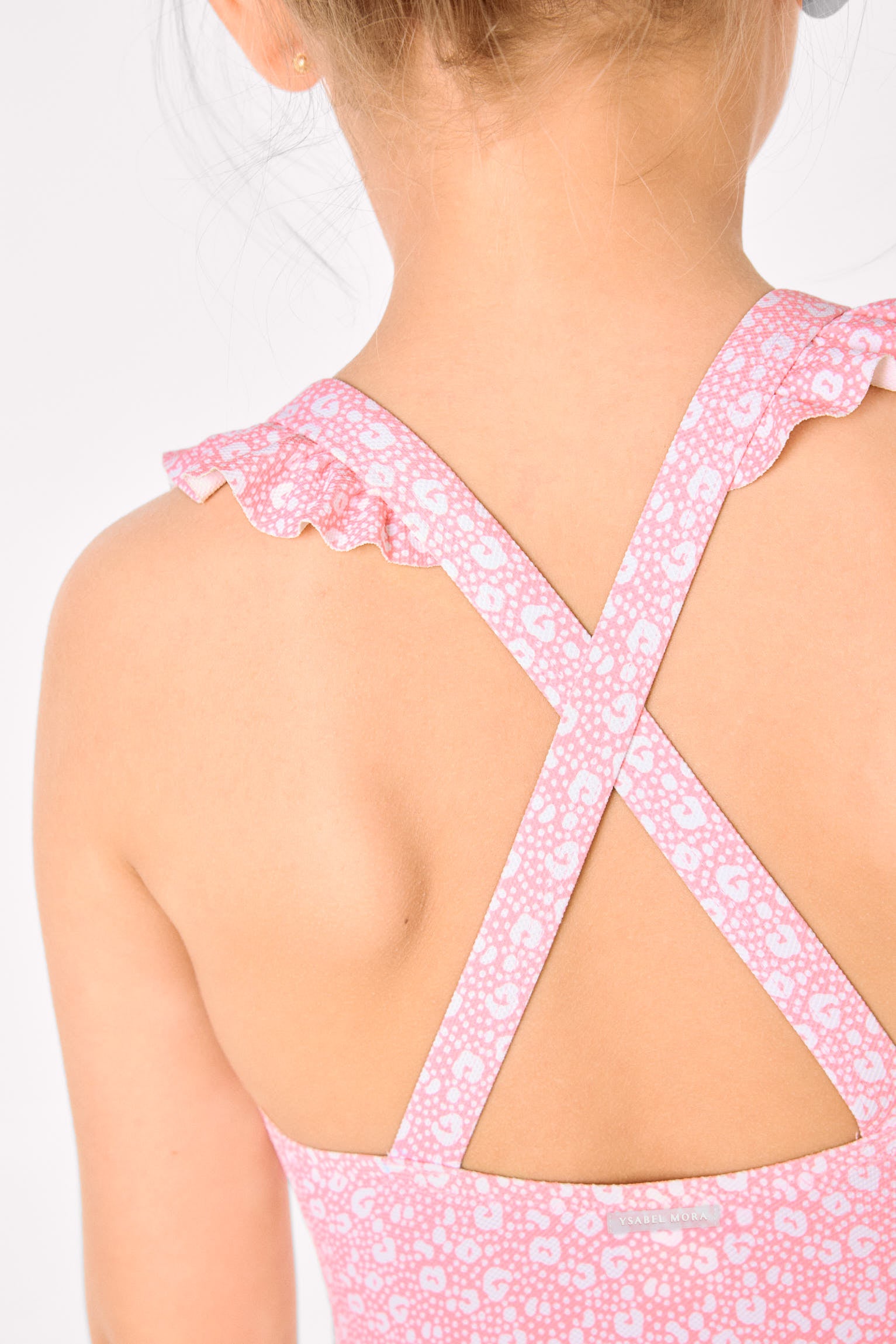 Girls' swimsuit with ruffle details and crossed straps, pink leopard print