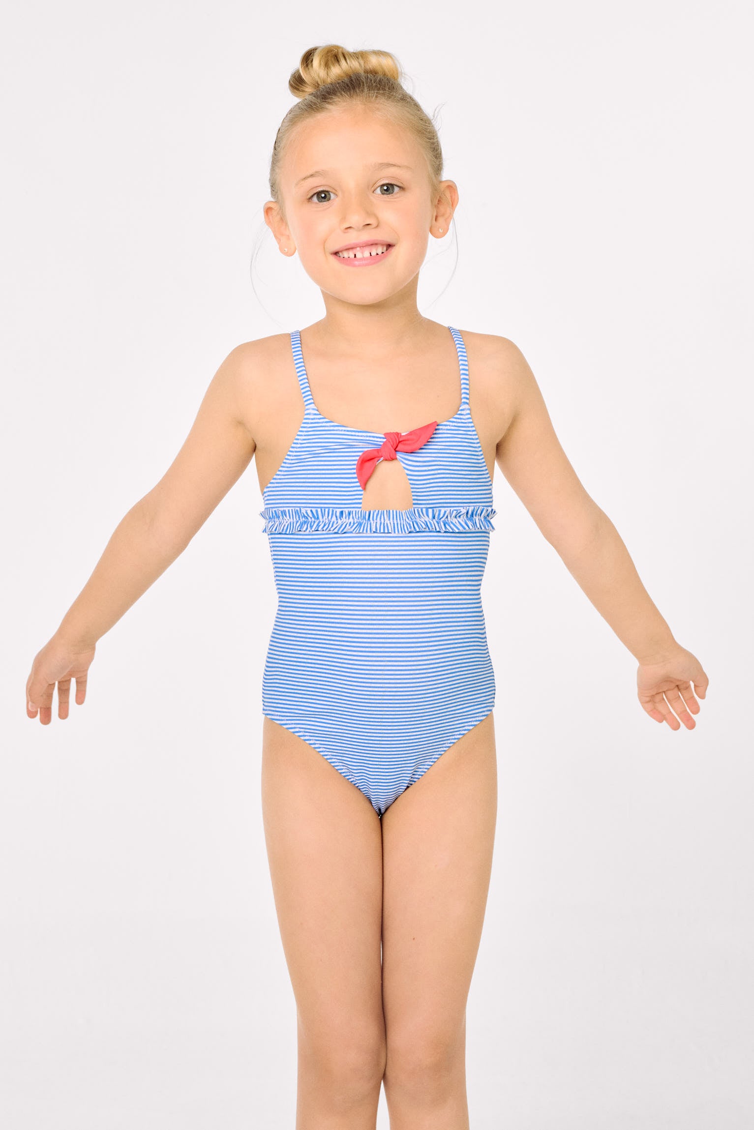 Girls' swimsuit with bow and ruffle detail, striped print