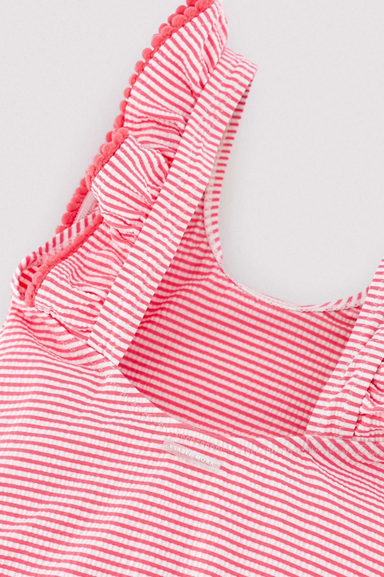 Girls' swimsuit with ruffled striped print