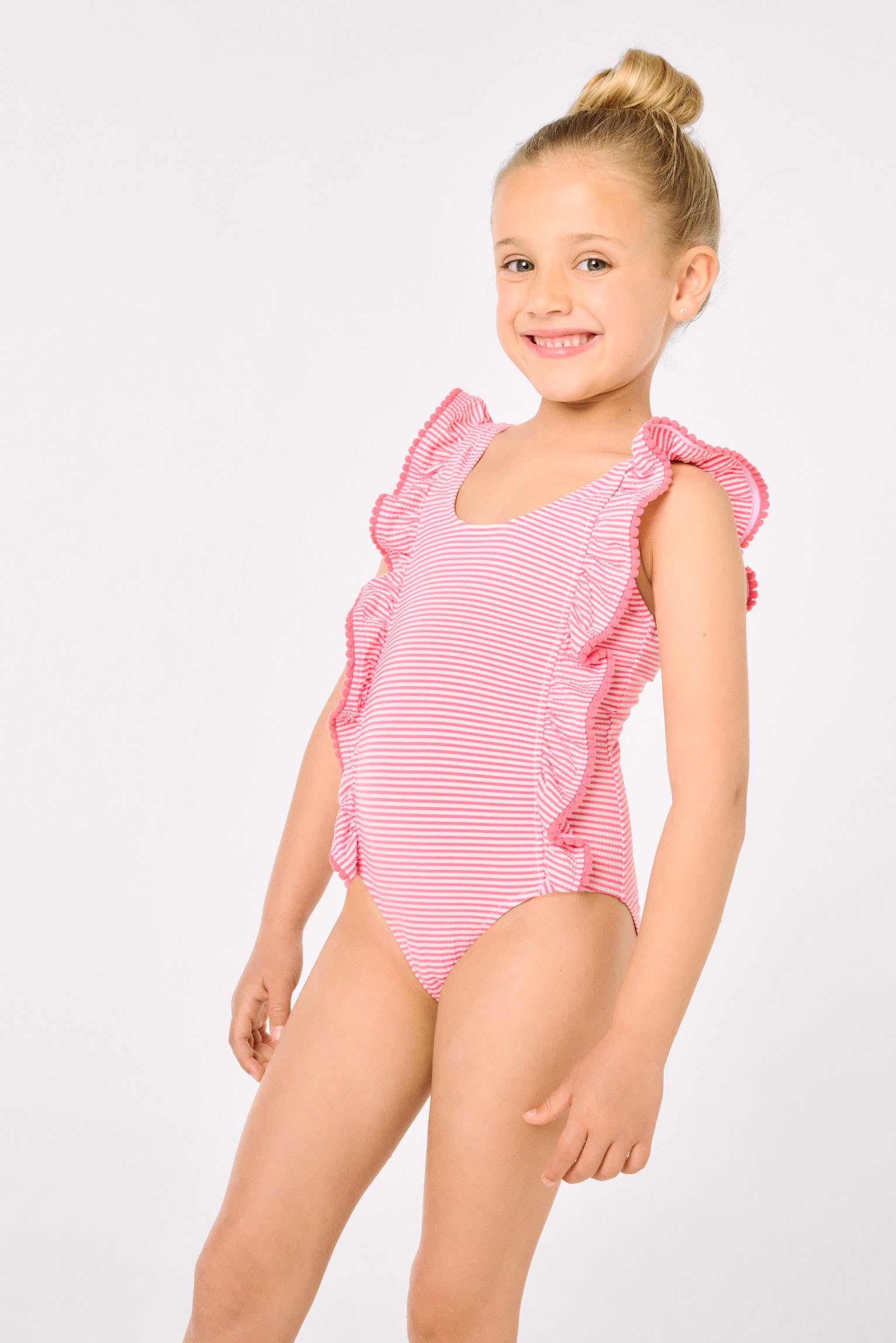 Girls' swimsuit with ruffled striped print