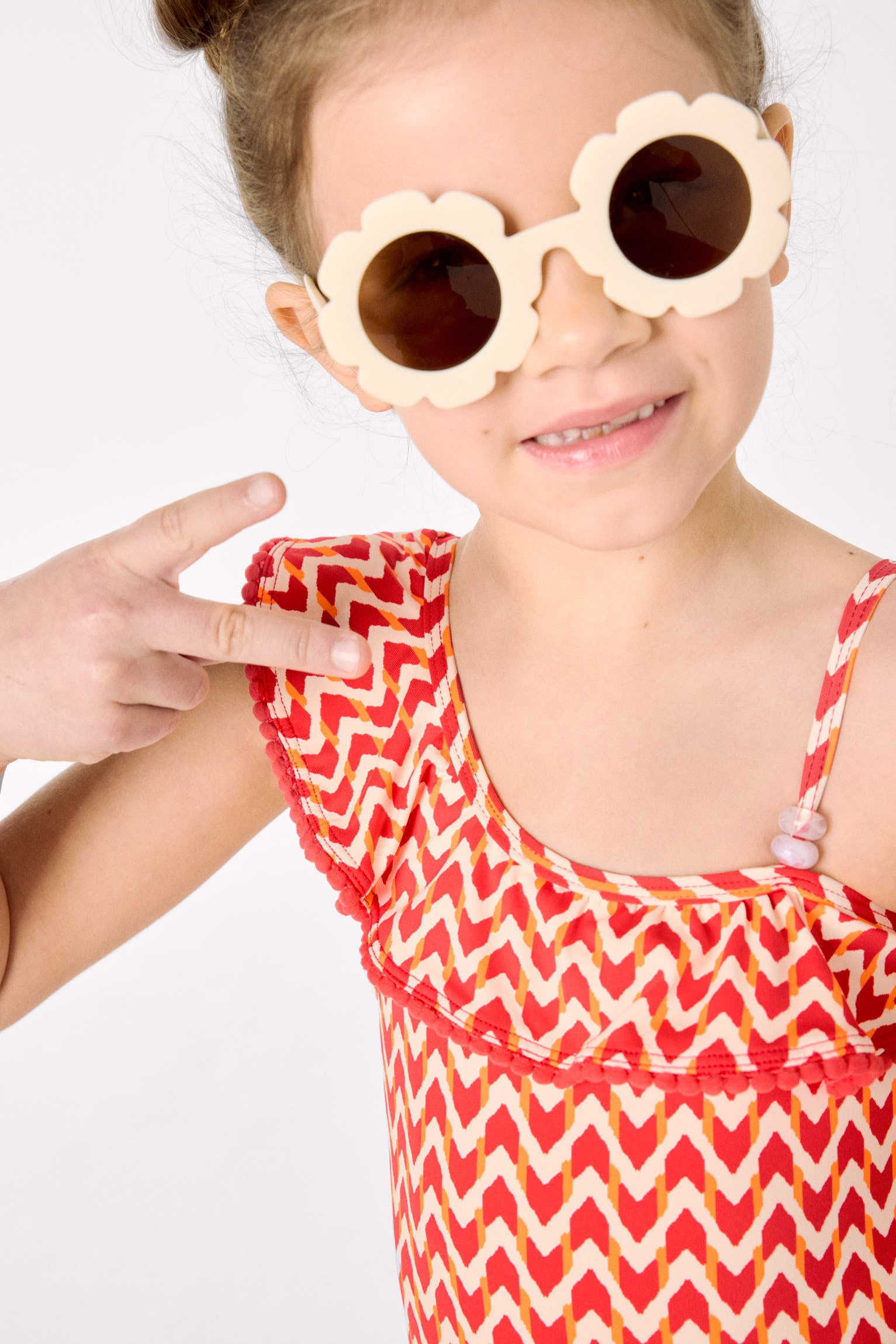 Girls' swimsuit with ruffle details and ethnic print