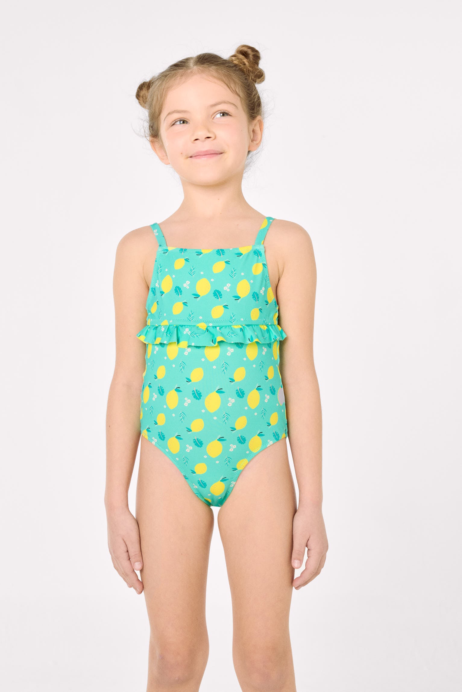 Girl's swimsuit with lemon print ruffle detail