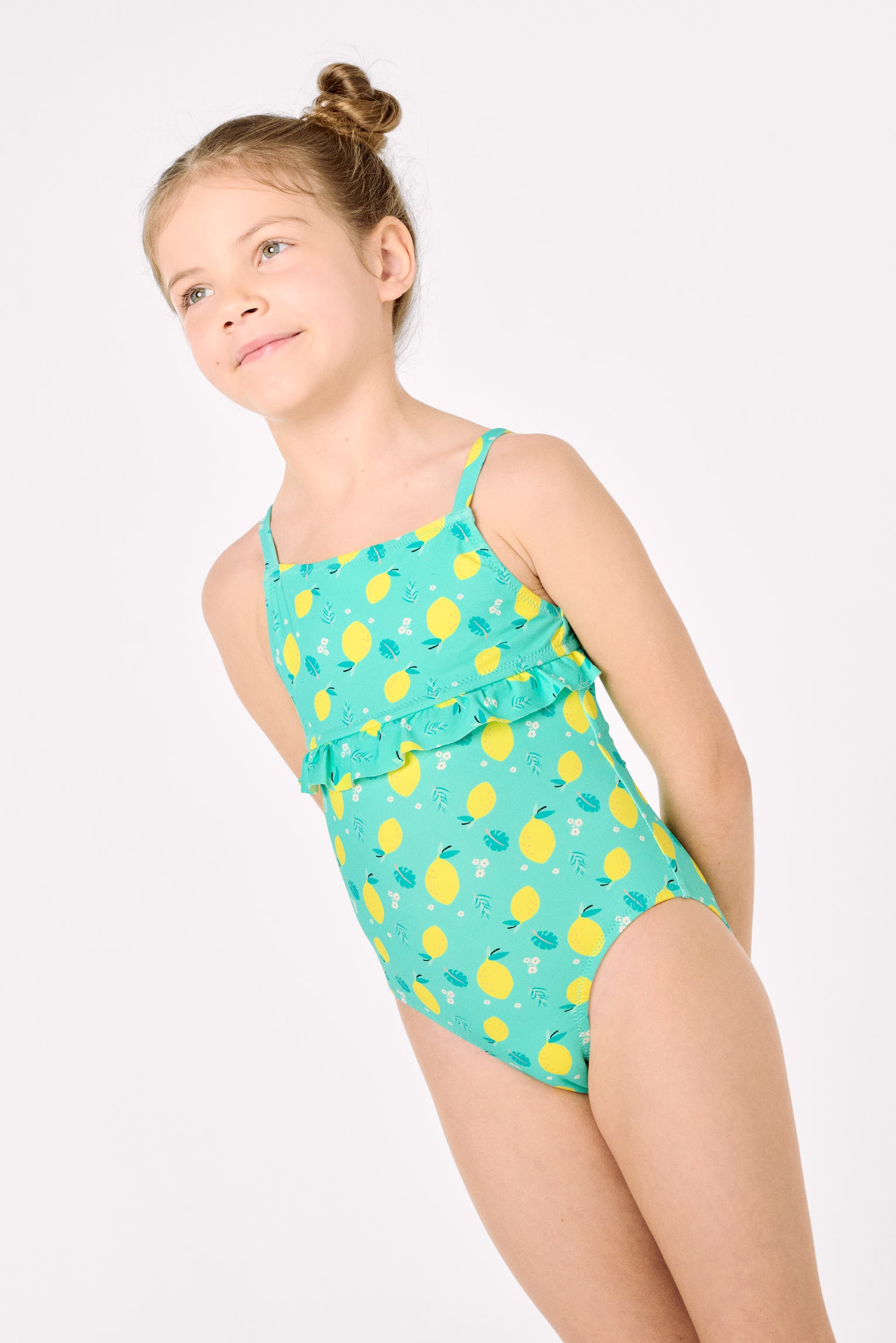Girl's swimsuit with lemon print ruffle detail