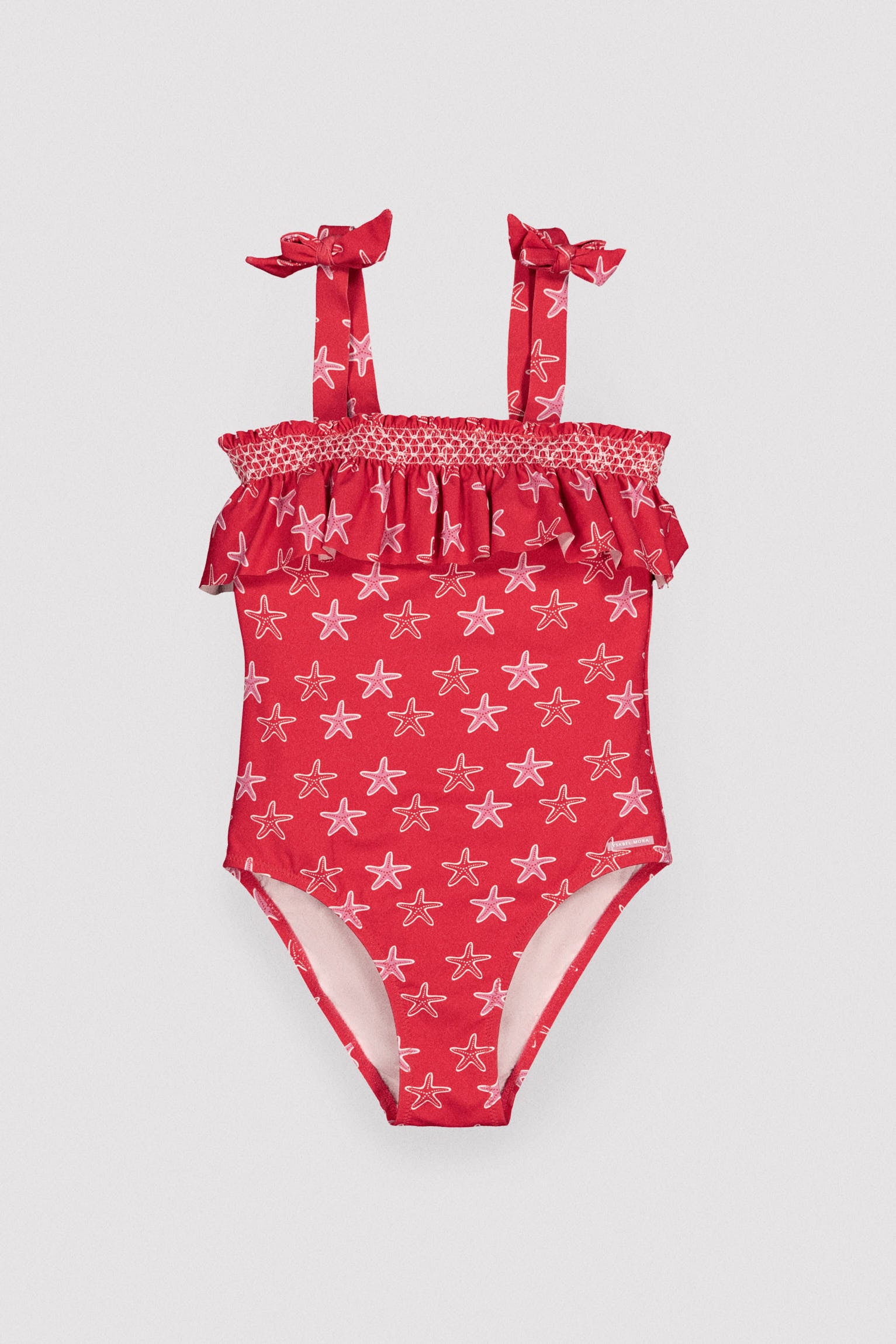 Girls' swimsuit with starfish print ruffle detail
