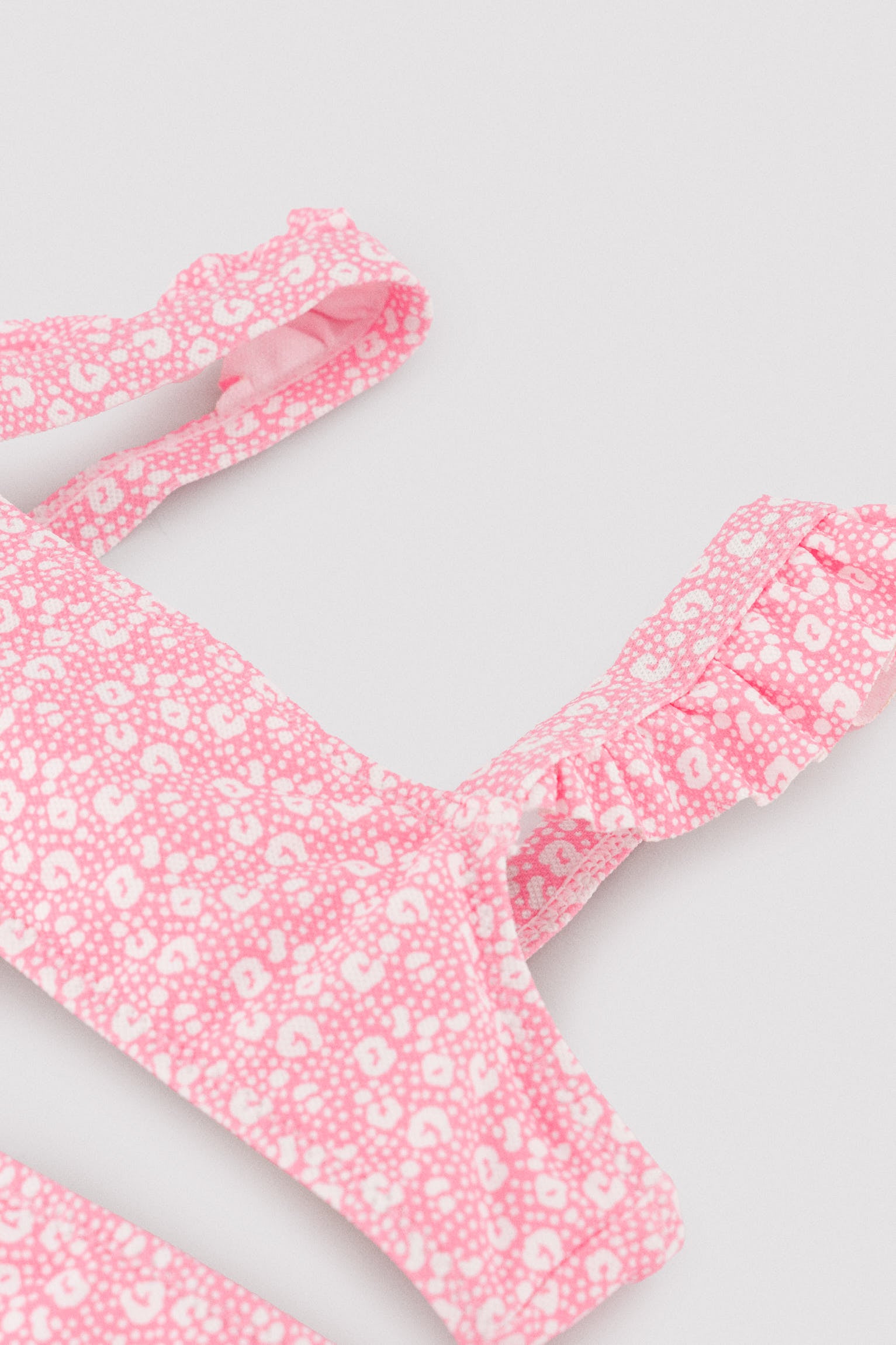 Girls' bikini with ruffle details, pink leopard print