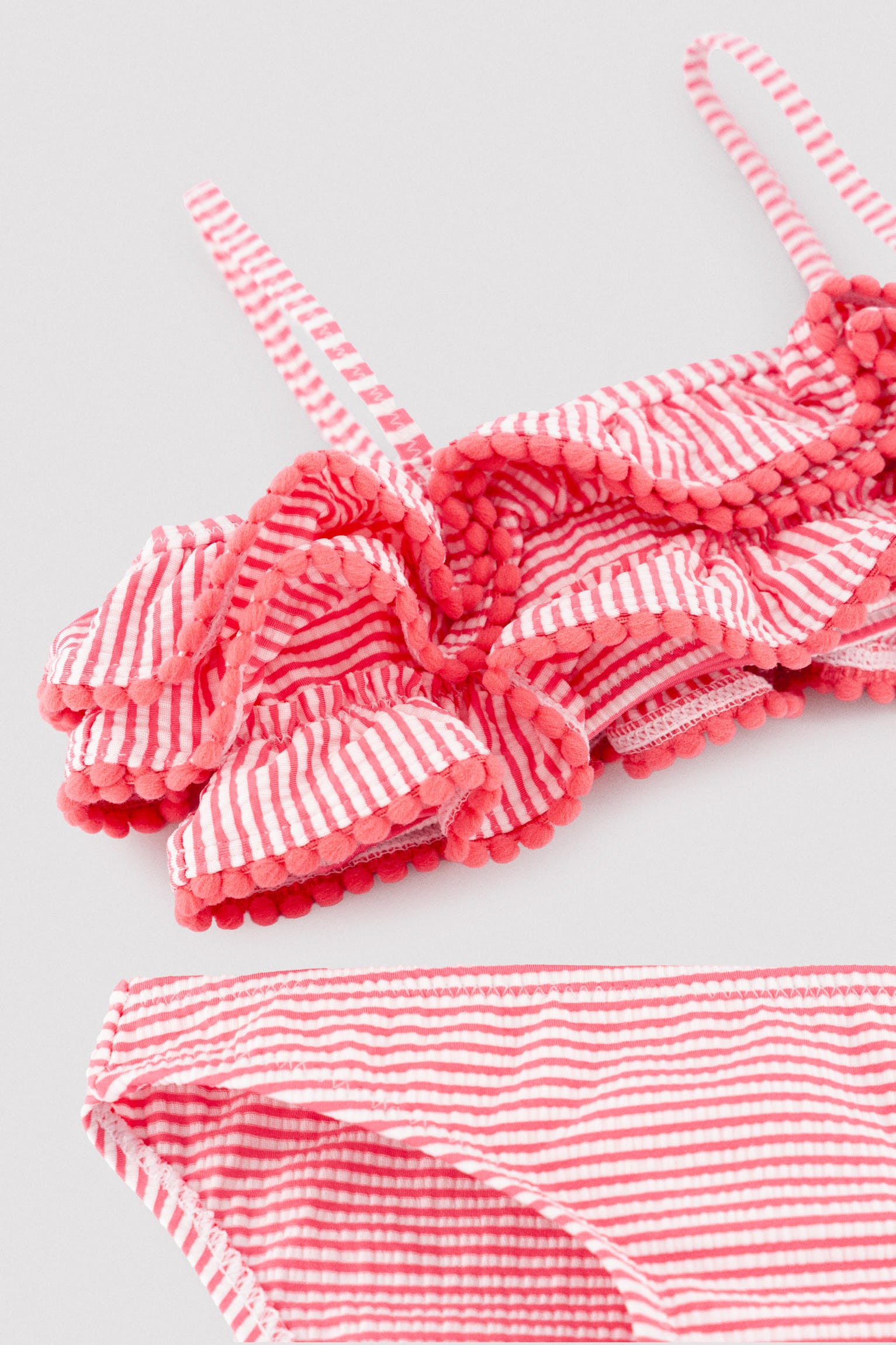 Girls' bikini with triple ruffle detail and striped print