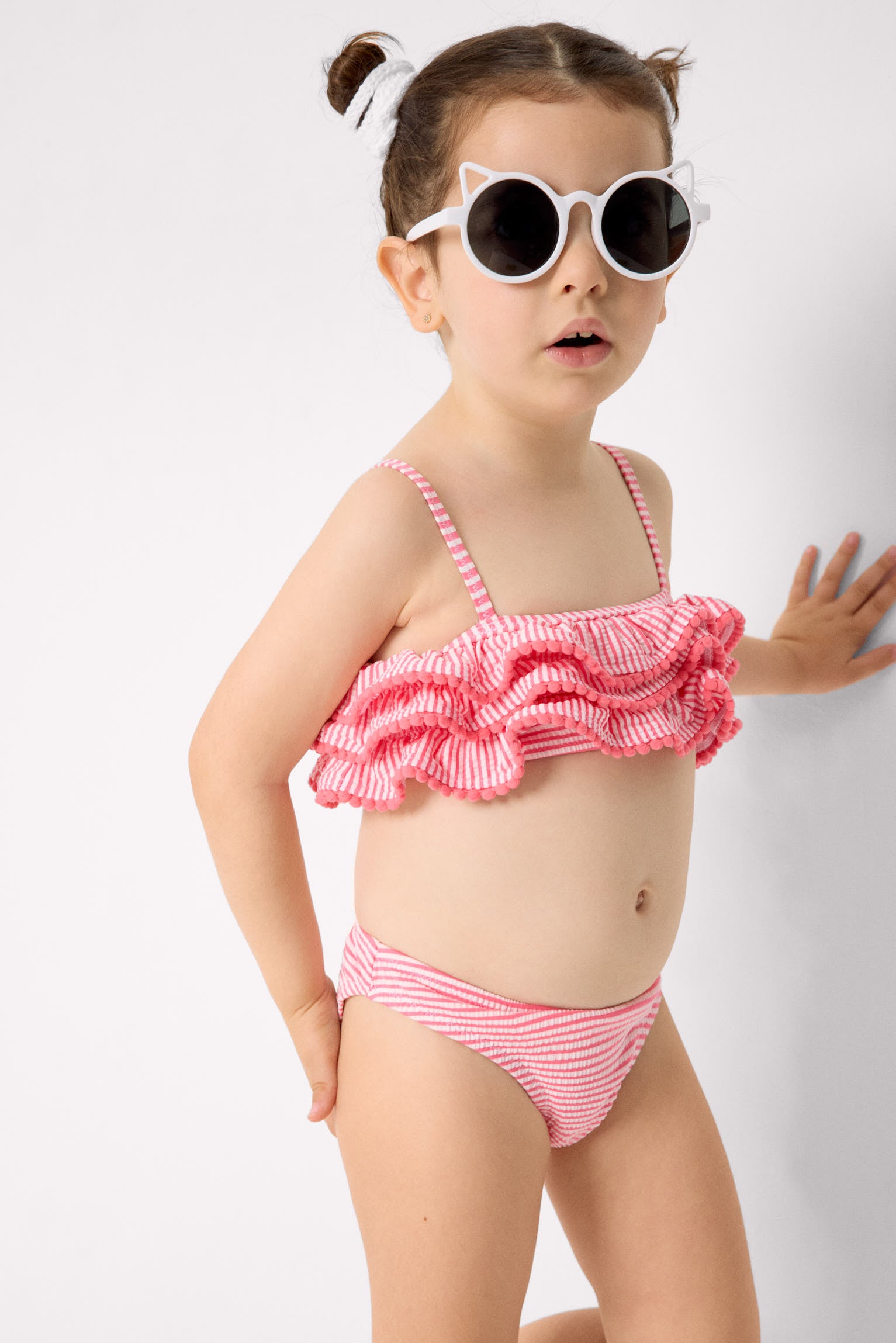 Girls' bikini with triple ruffle detail and striped print
