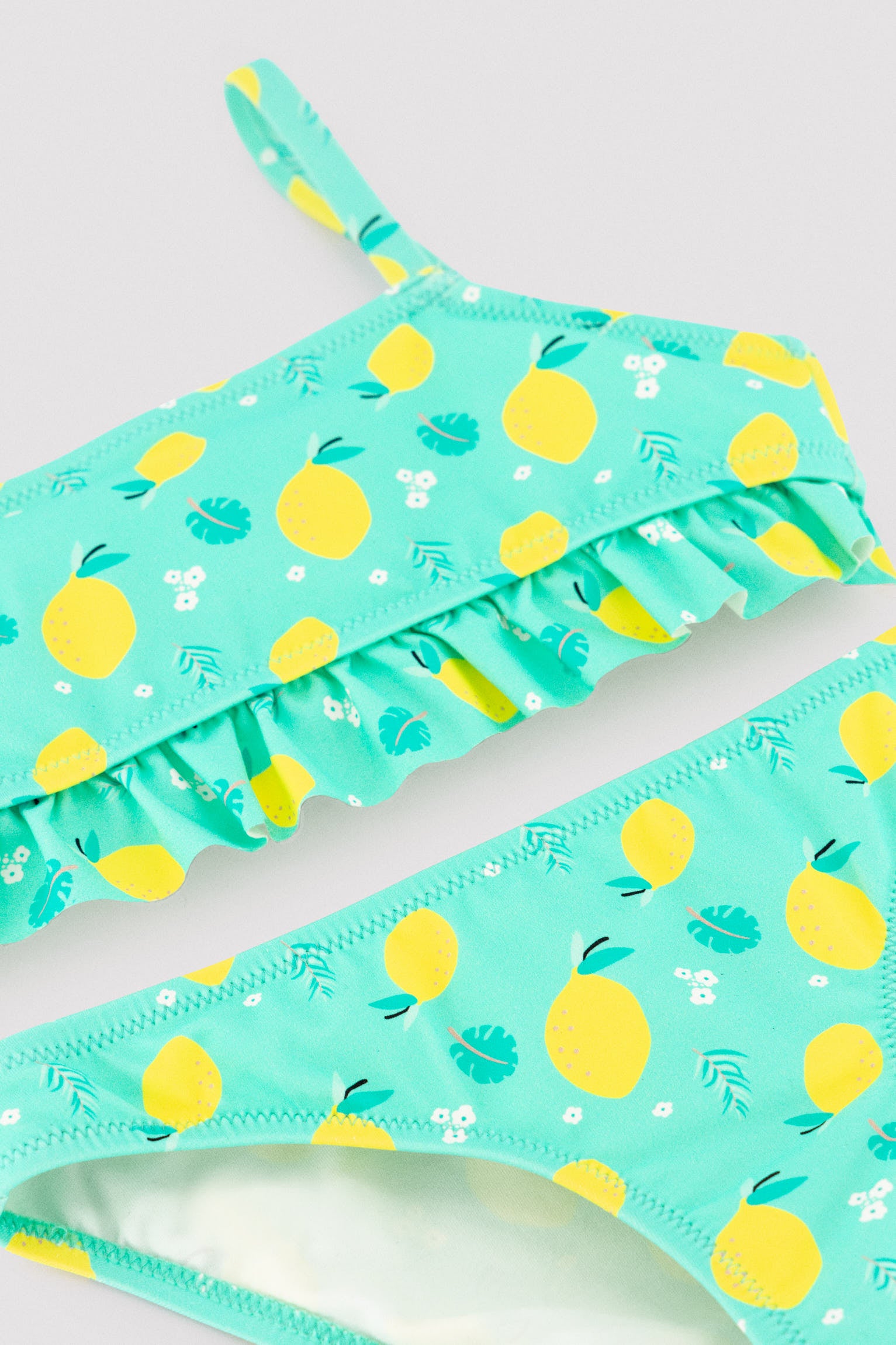 Girl's bikini with lemon print ruffle detail