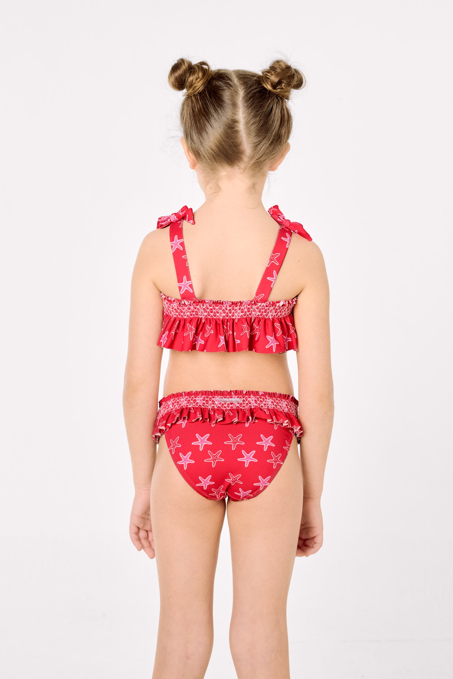 Girls' bikini with ruffle details and honeycomb pattern with starfish