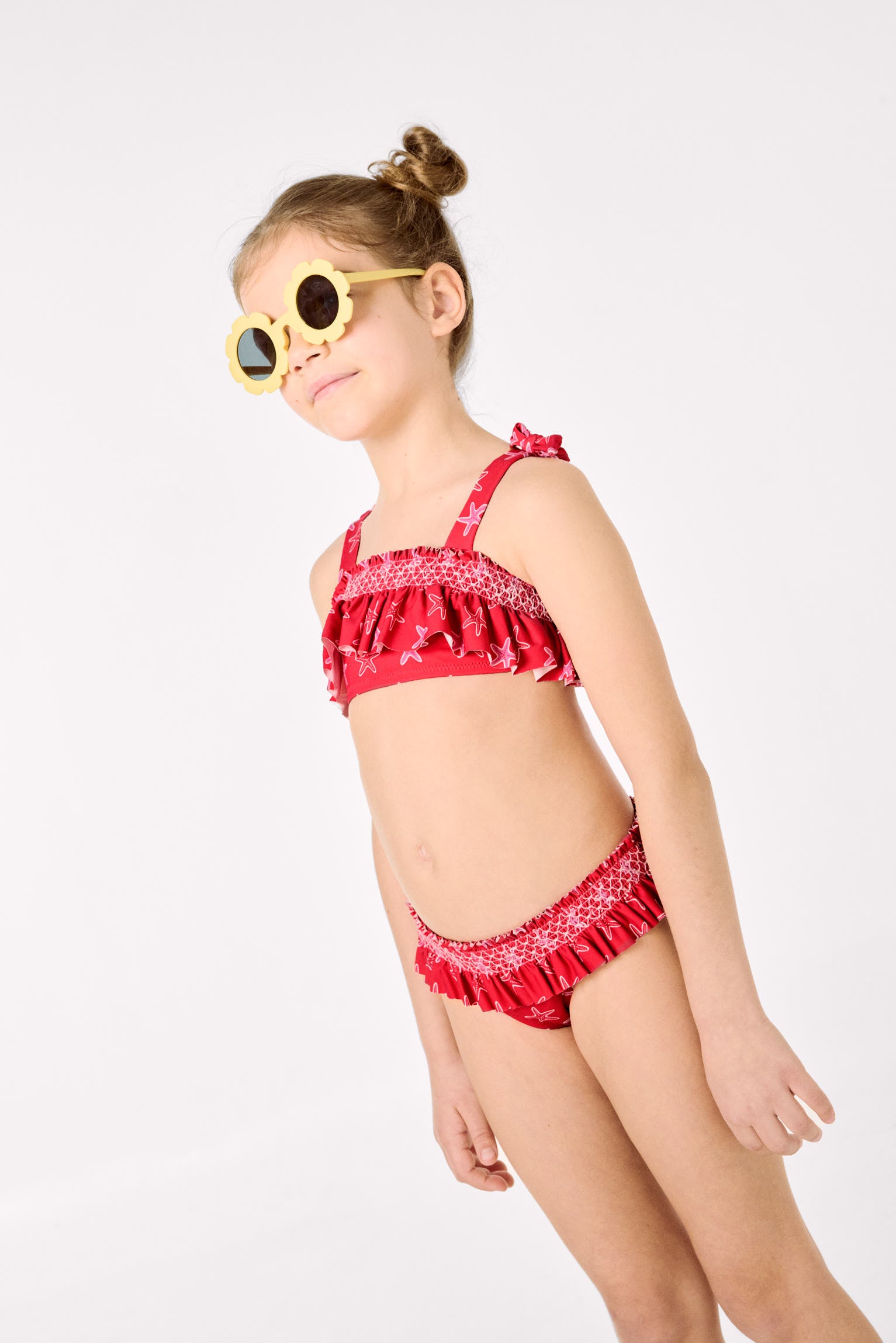 Girls' bikini with ruffle details and honeycomb pattern with starfish