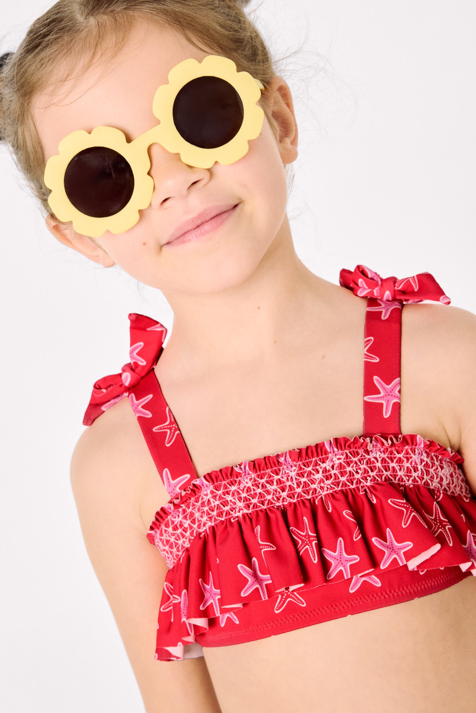 Girls' bikini with ruffle details and honeycomb pattern with starfish