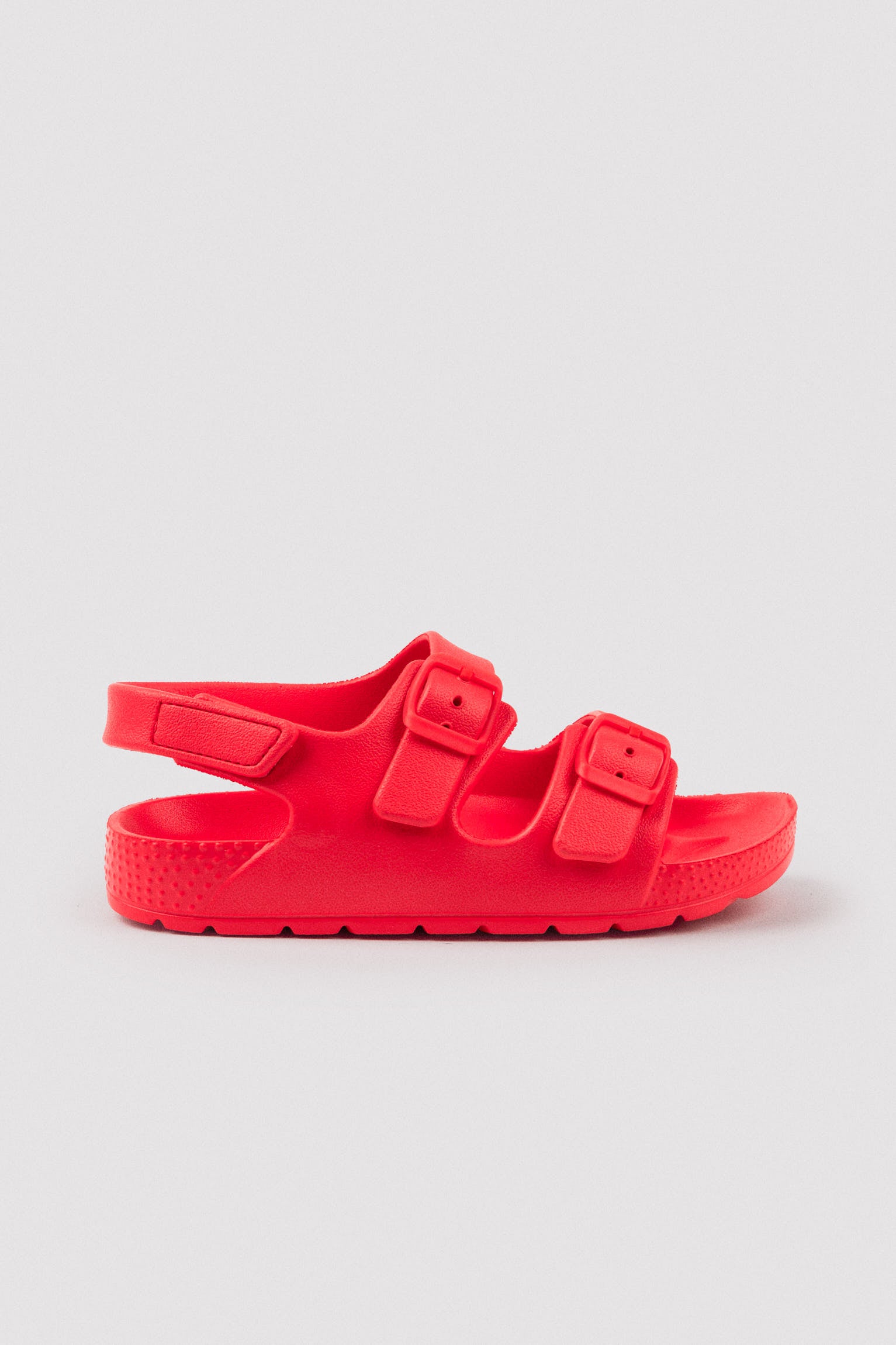 Children's flip-flops with adjustable buckles and red velcro