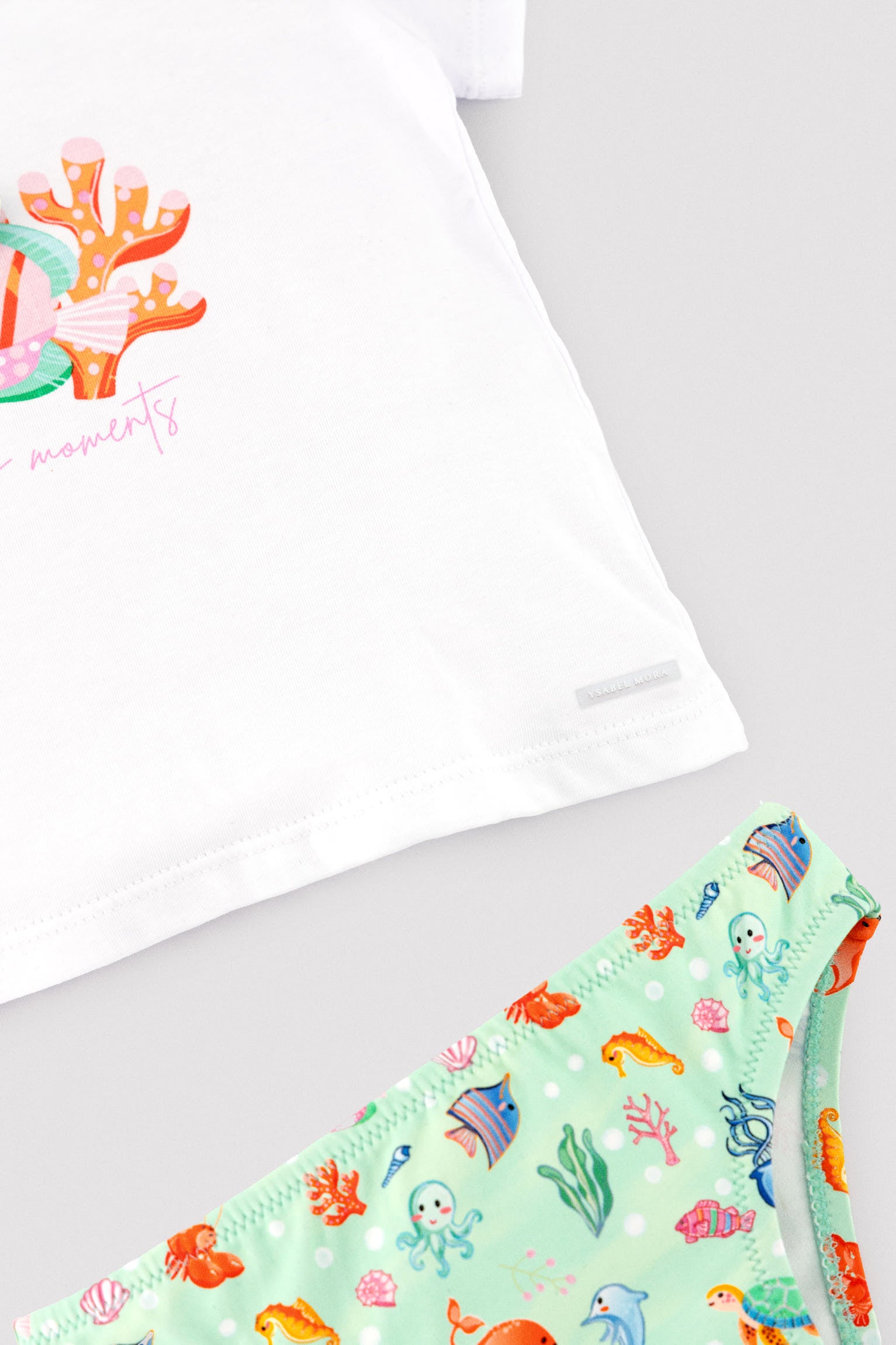 Baby set with t-shirt and bloomers featuring a marine animal print