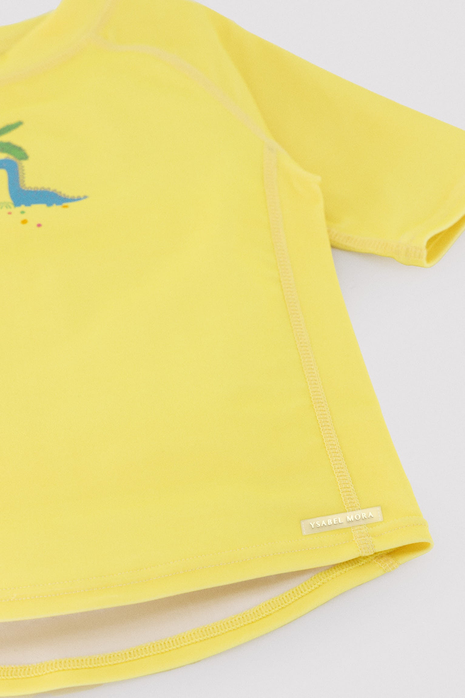 Baby swim shirt with dinosaur and palm tree print