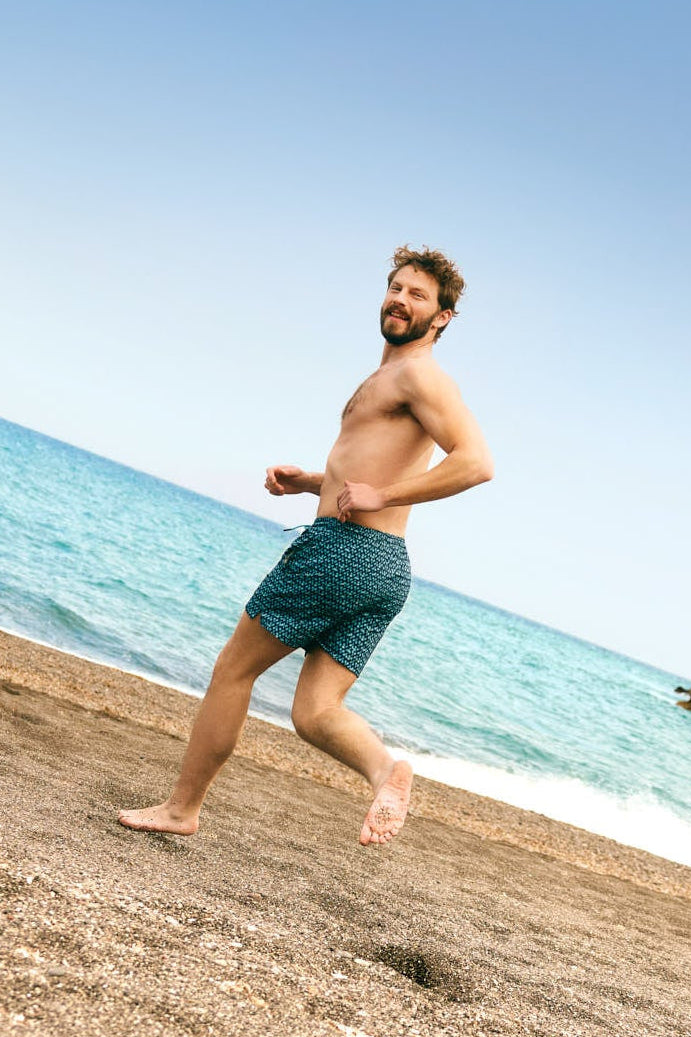 Half swimsuit with anti-chafing mesh lining and tennis racket print