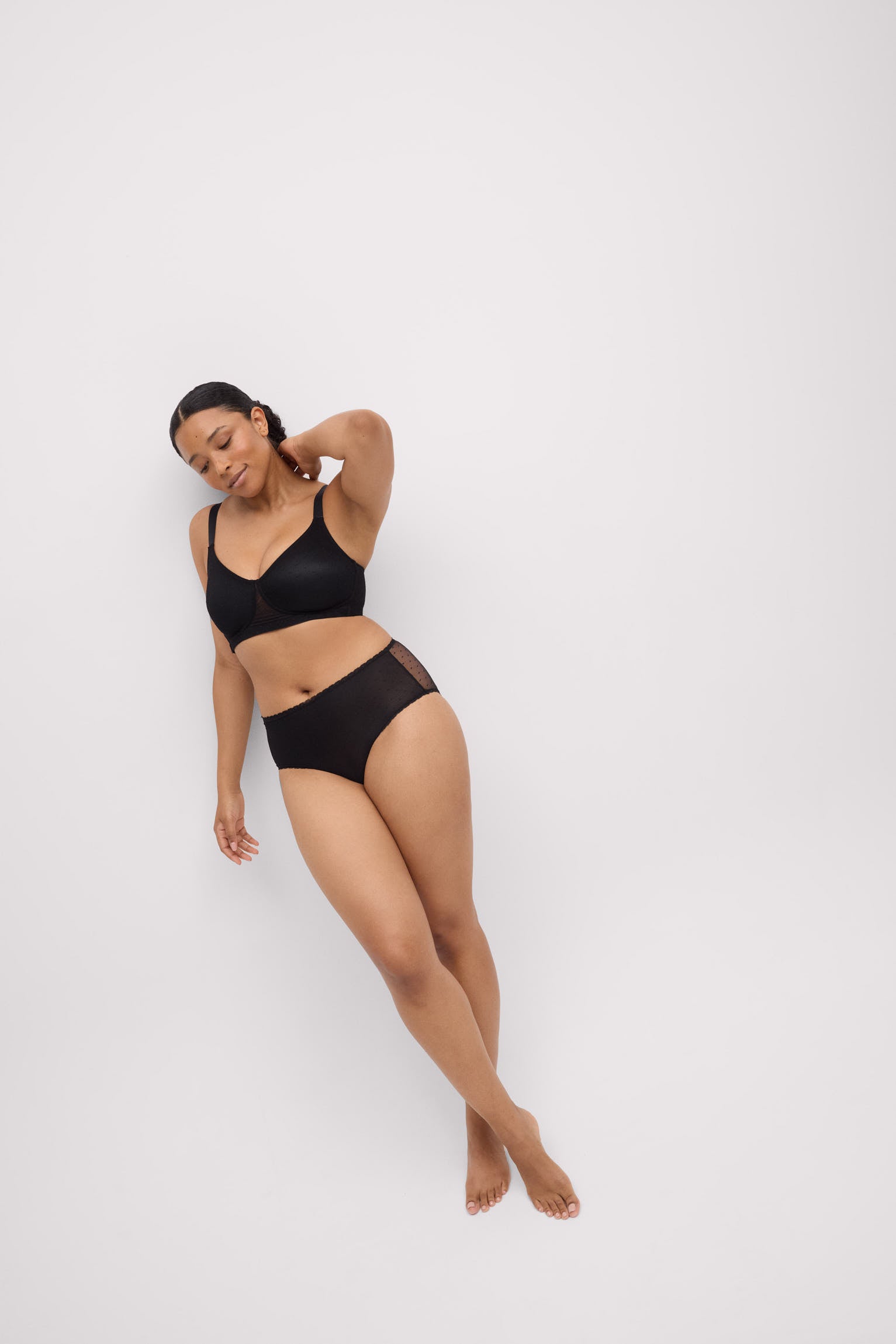Black minimiser bra and high-waisted panties lingerie set