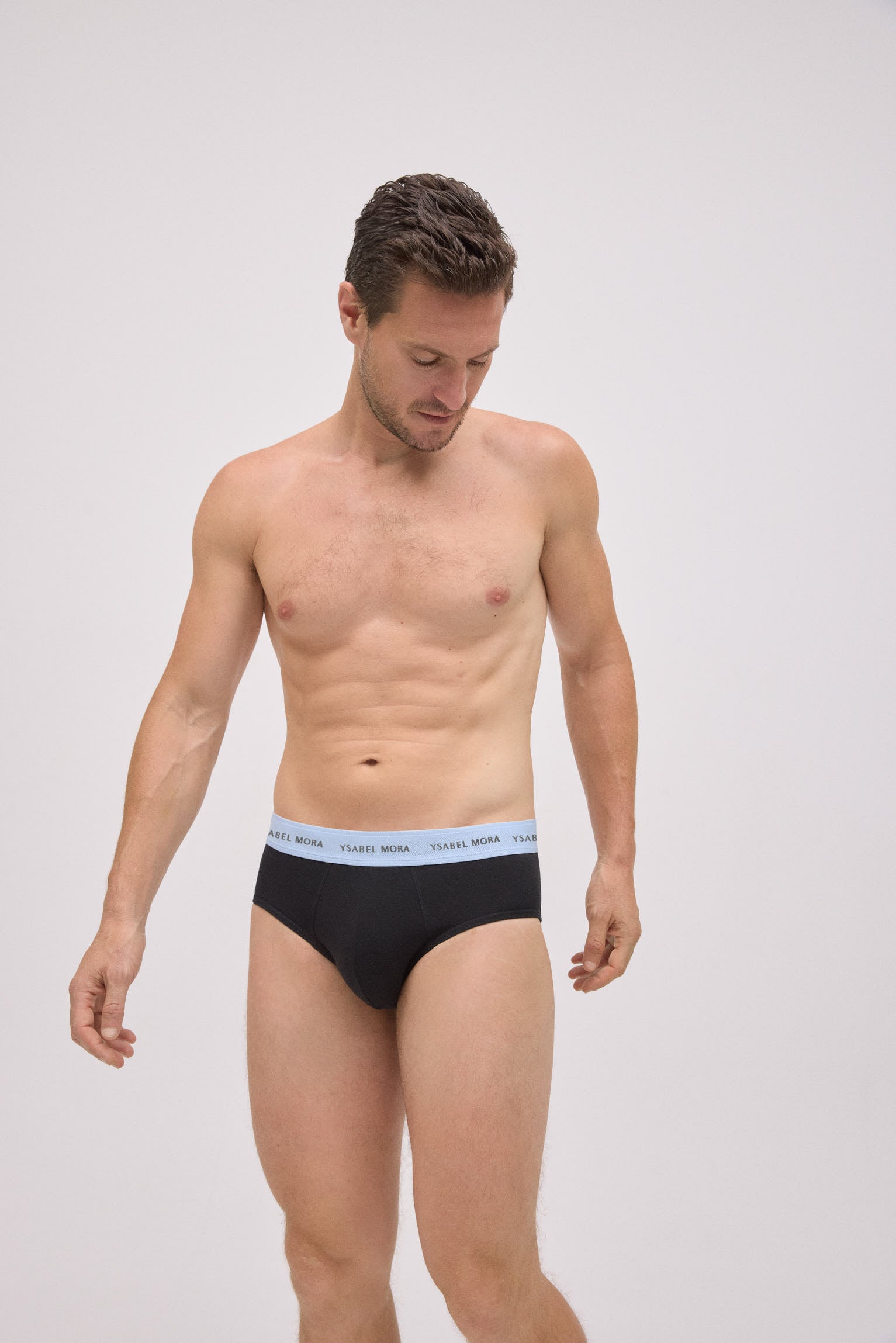 Pack of 6 basic black briefs with a colored band