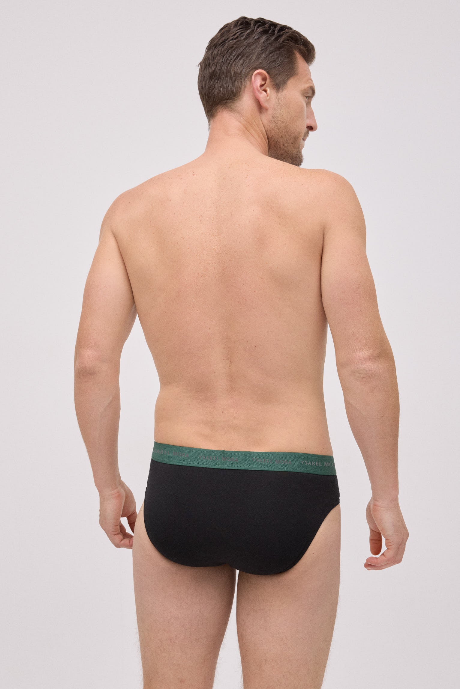 Pack of 6 basic black briefs with a colored band