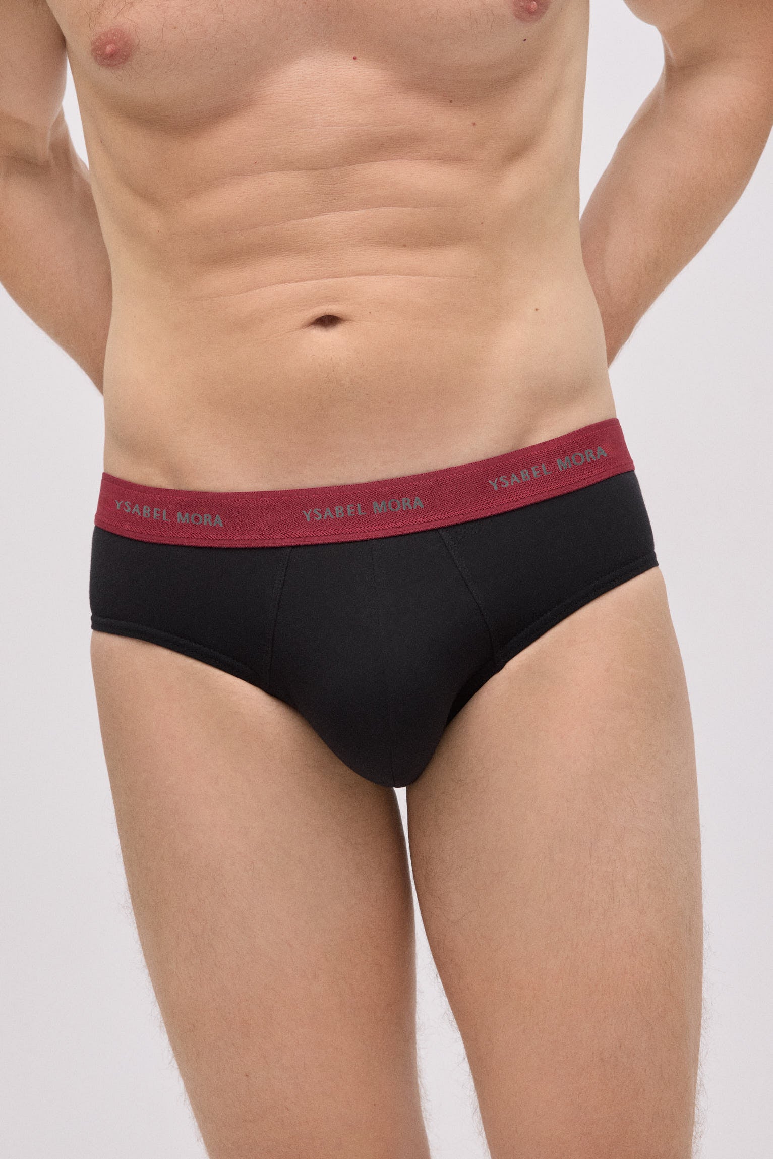 Pack of 6 basic black briefs with a colored band