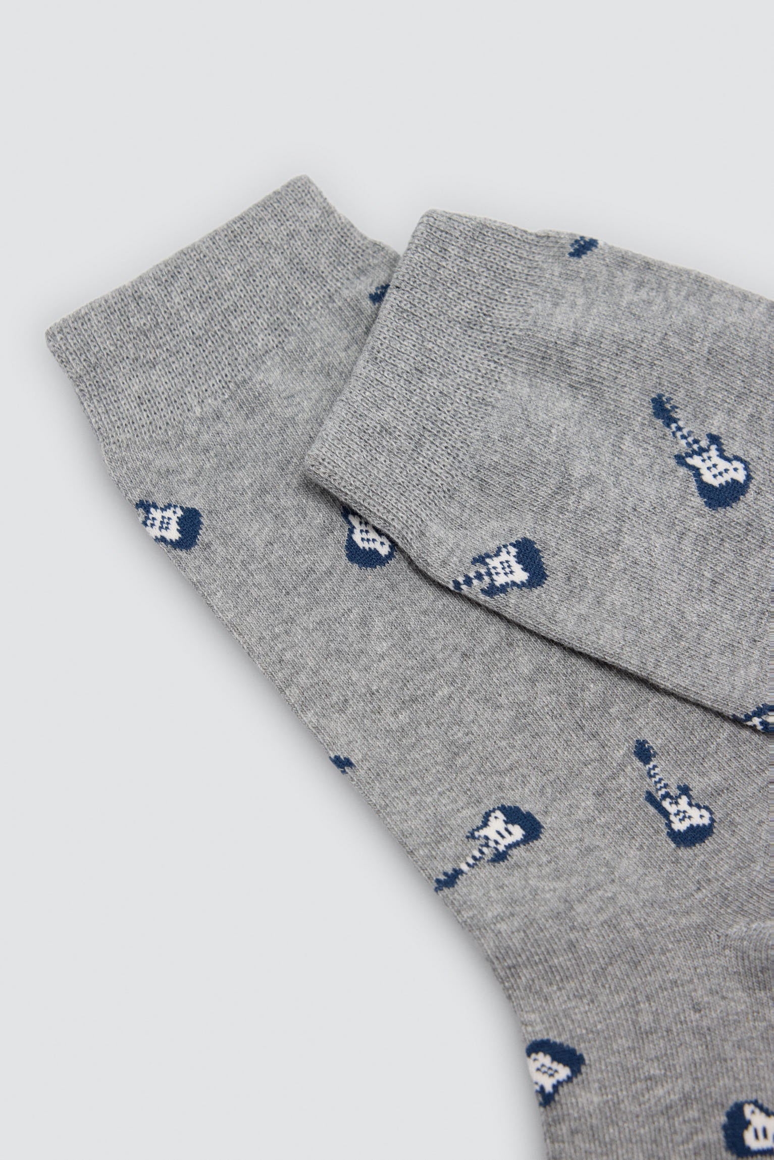 Pack of 4 socks with animal, guitar and rocket prints
