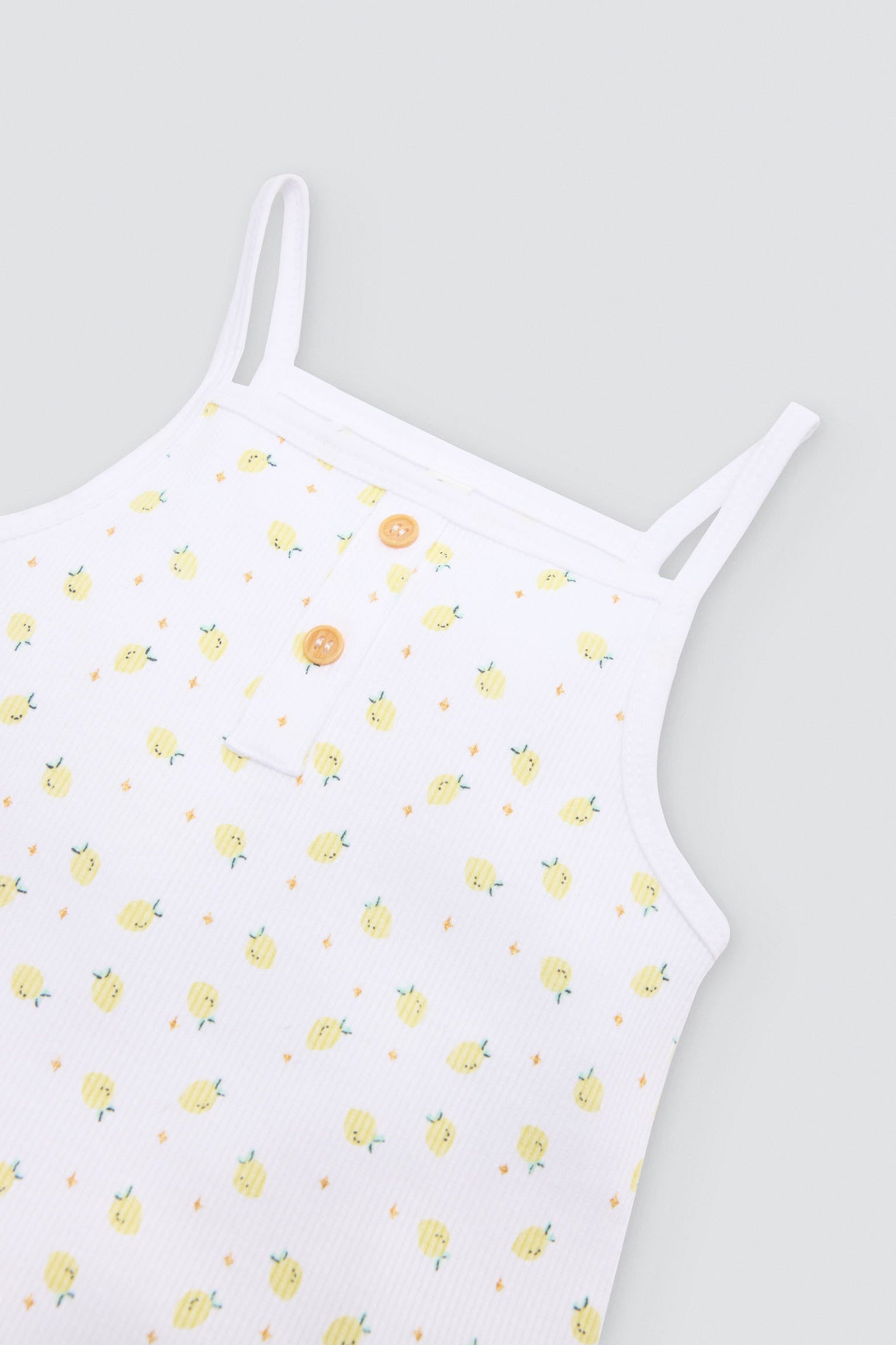 Peto bebé sin mangas estampado limones - Ysabel Mora
