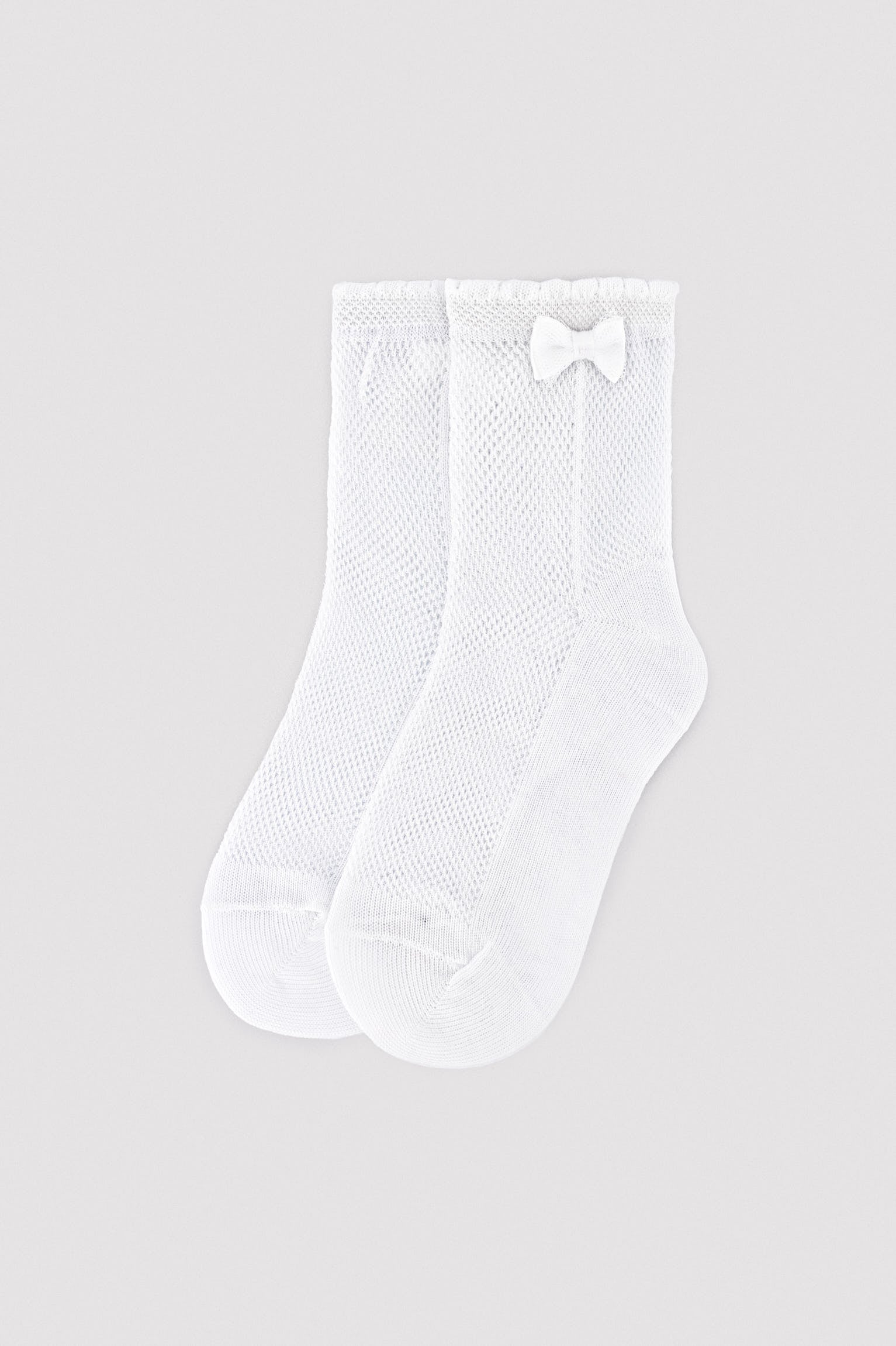 Children's openwork socks with white bow detail