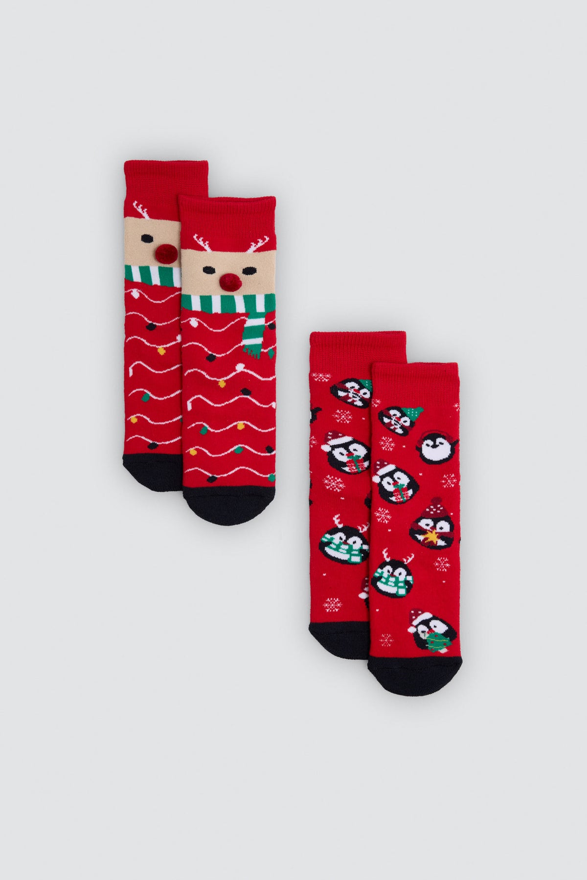 Pack of 2 children's Christmas socks with reindeer and penguins