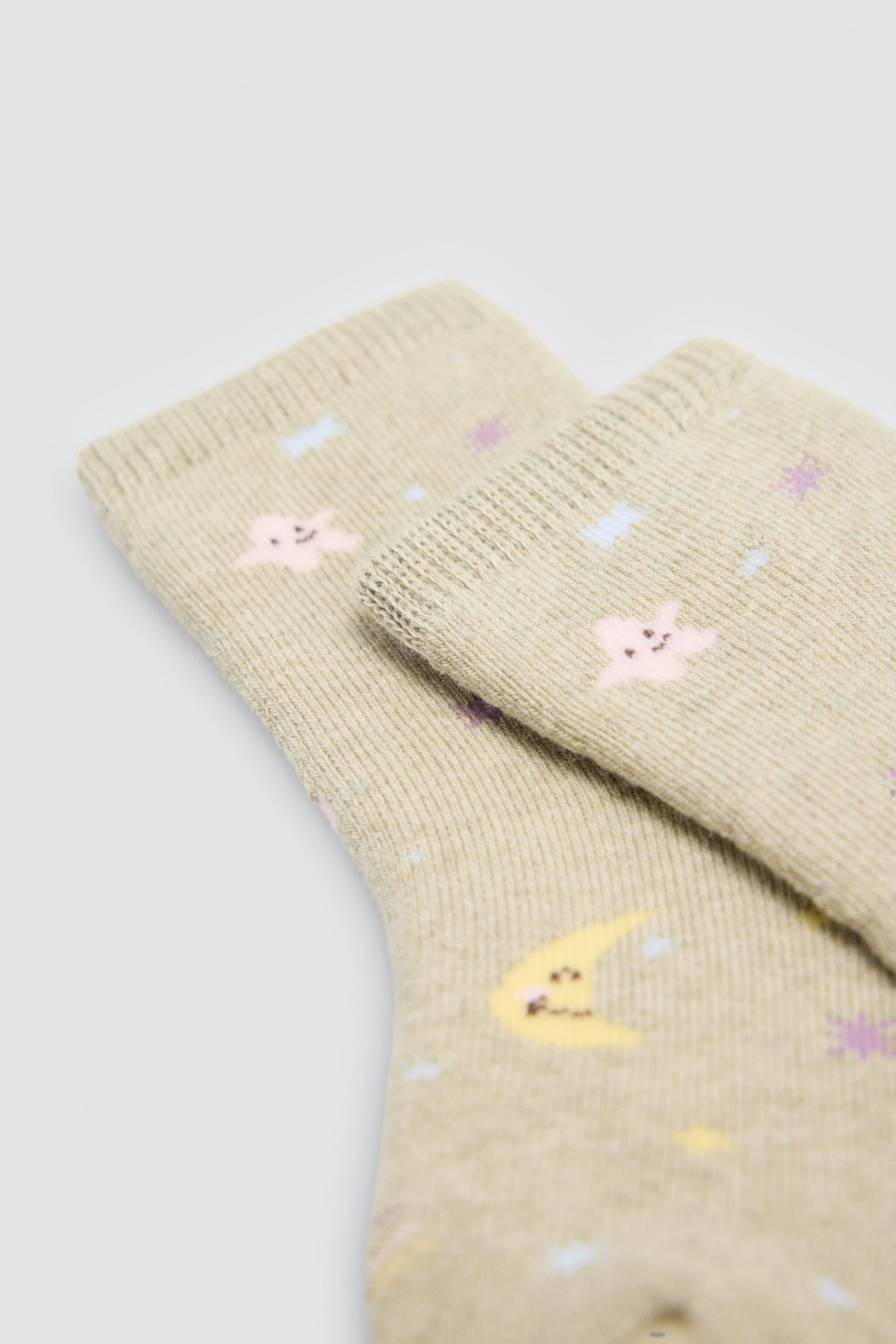 Pack of 4 baby thermal socks with moon and star prints