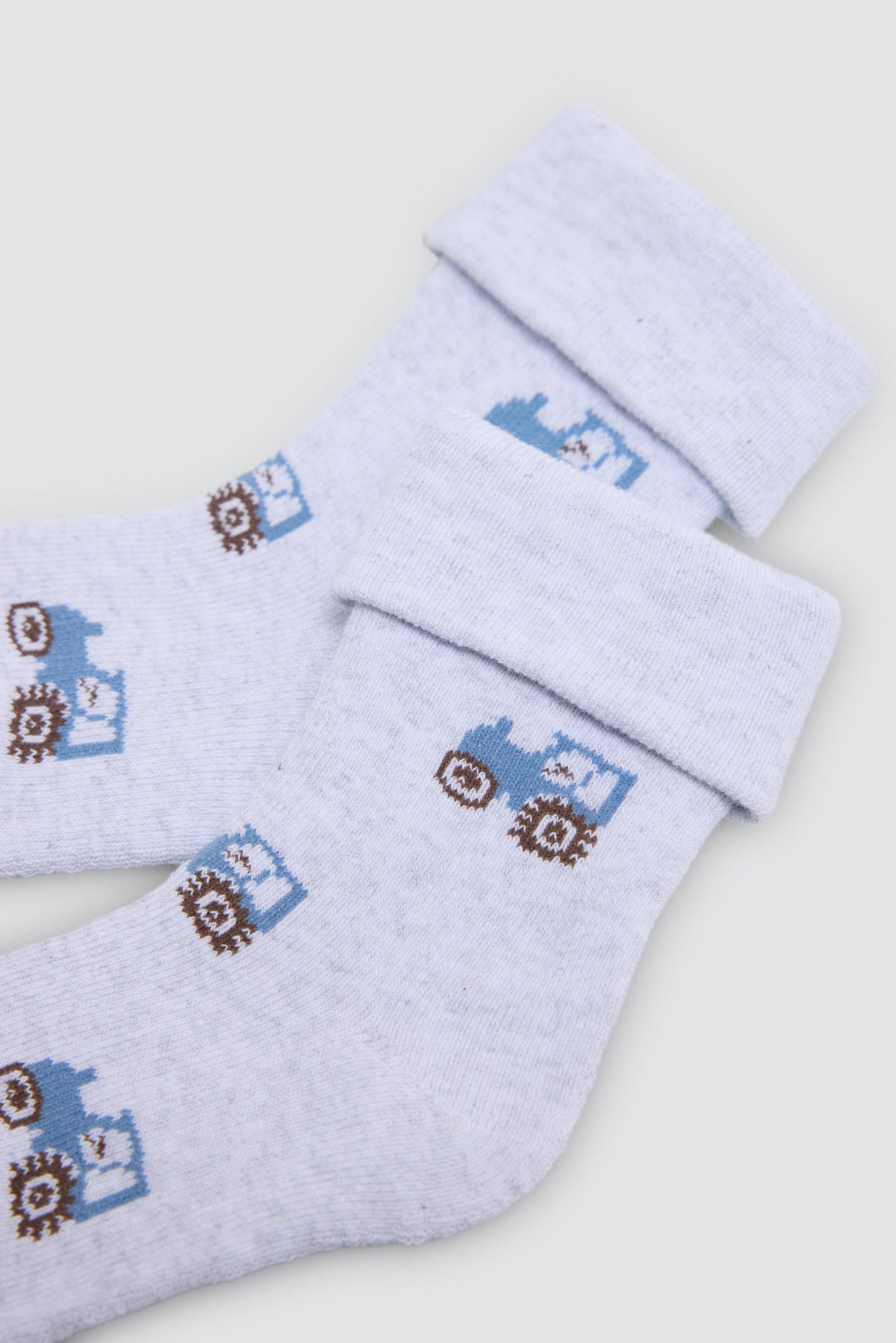 Pack of 4 baby thermal socks with tractor and pig prints