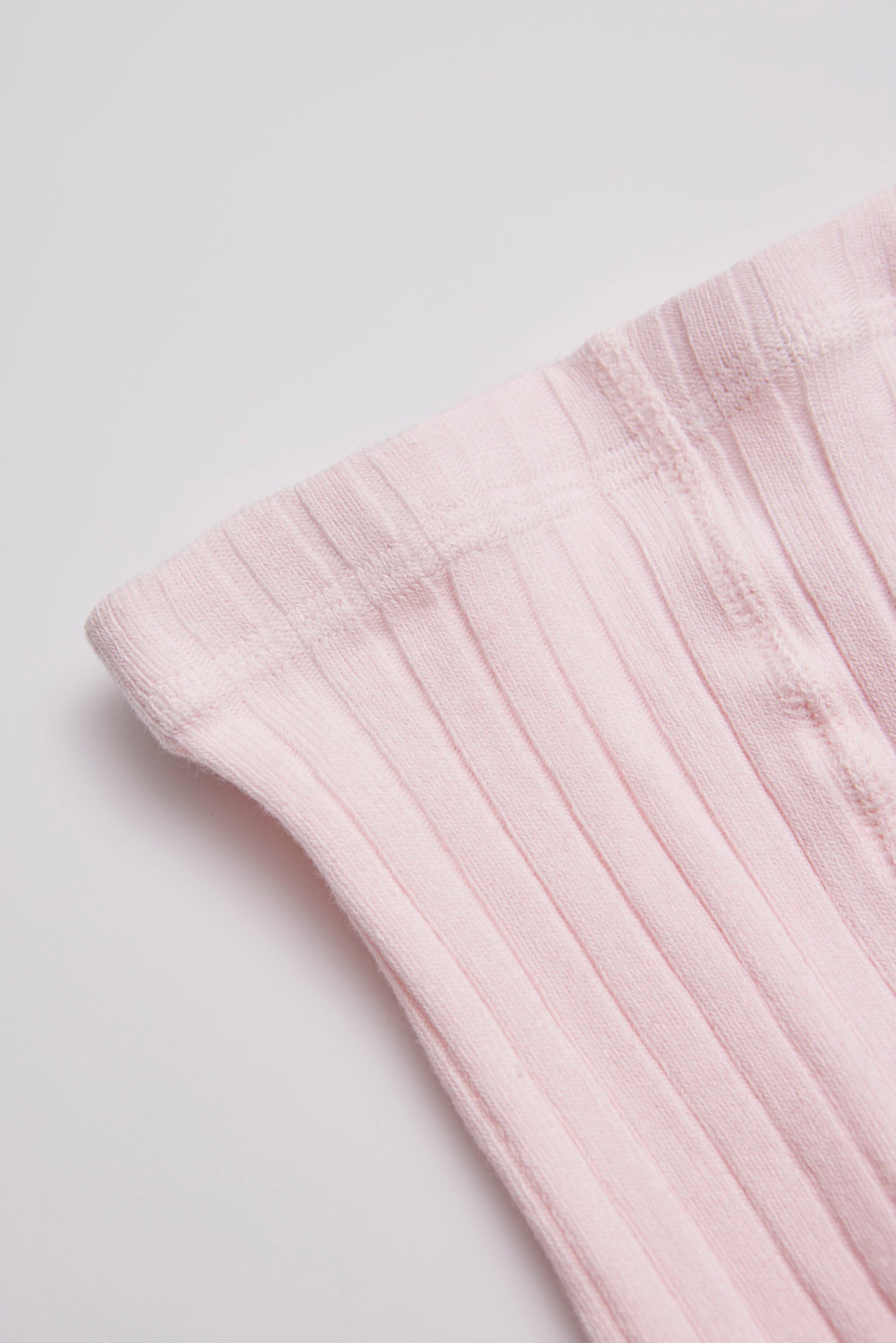 Pale pink ribbed leotard