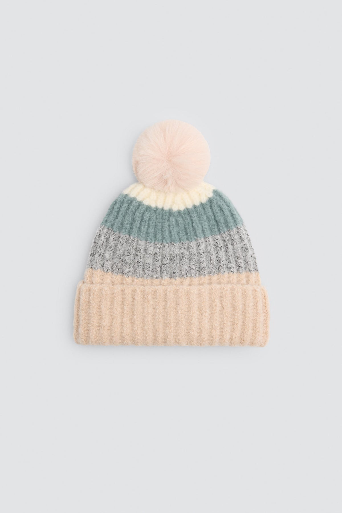 Gorro de punto detalle  pompón con  forro polar multicolor