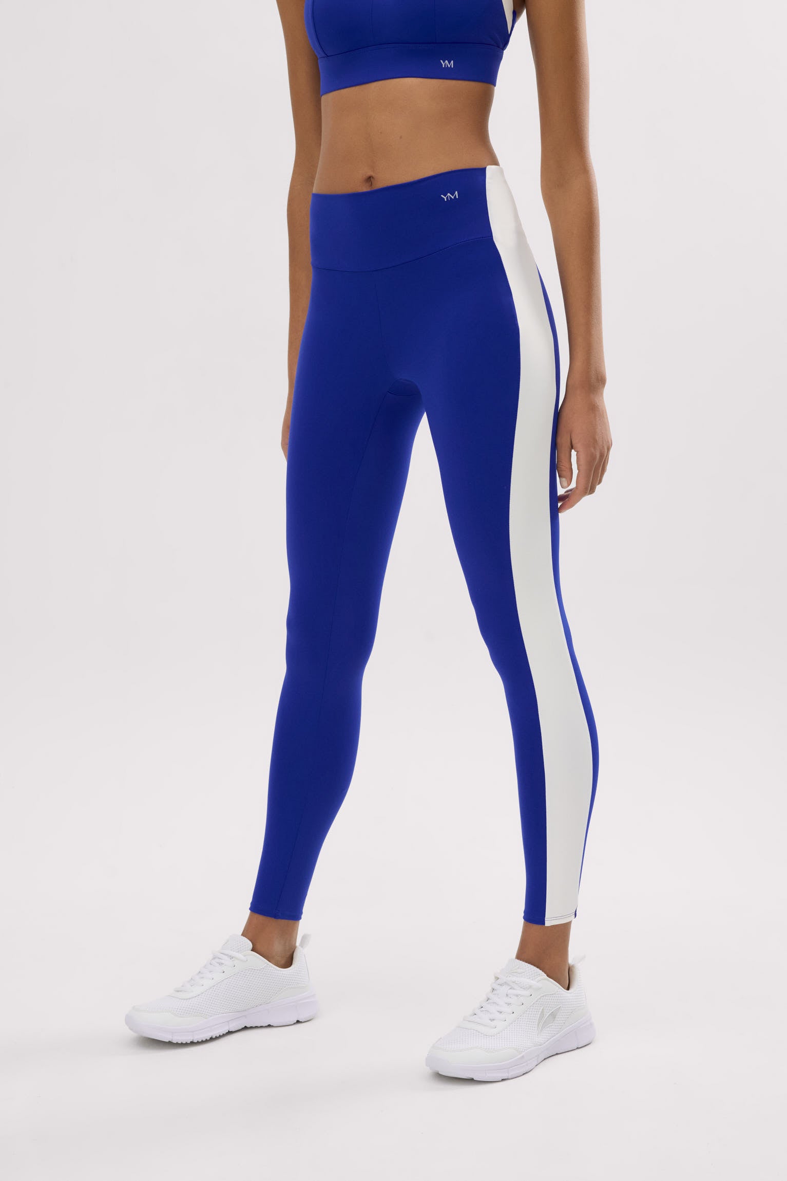 Leggings deportivos largos efecto push-up azul índigo con franja en contraste - Ysabel Mora
