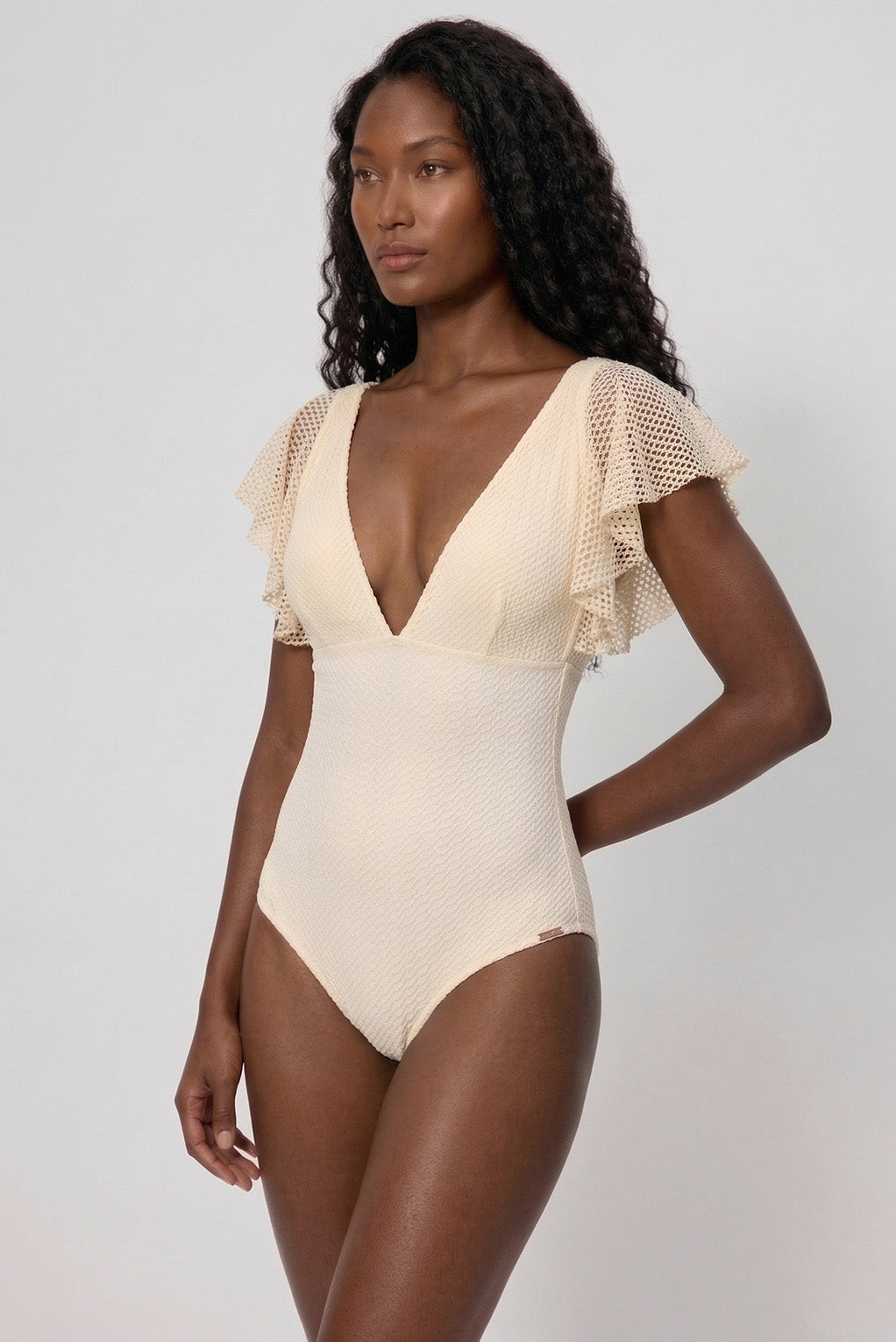 Ivory openwork swimsuit with deep neckline, cup B
