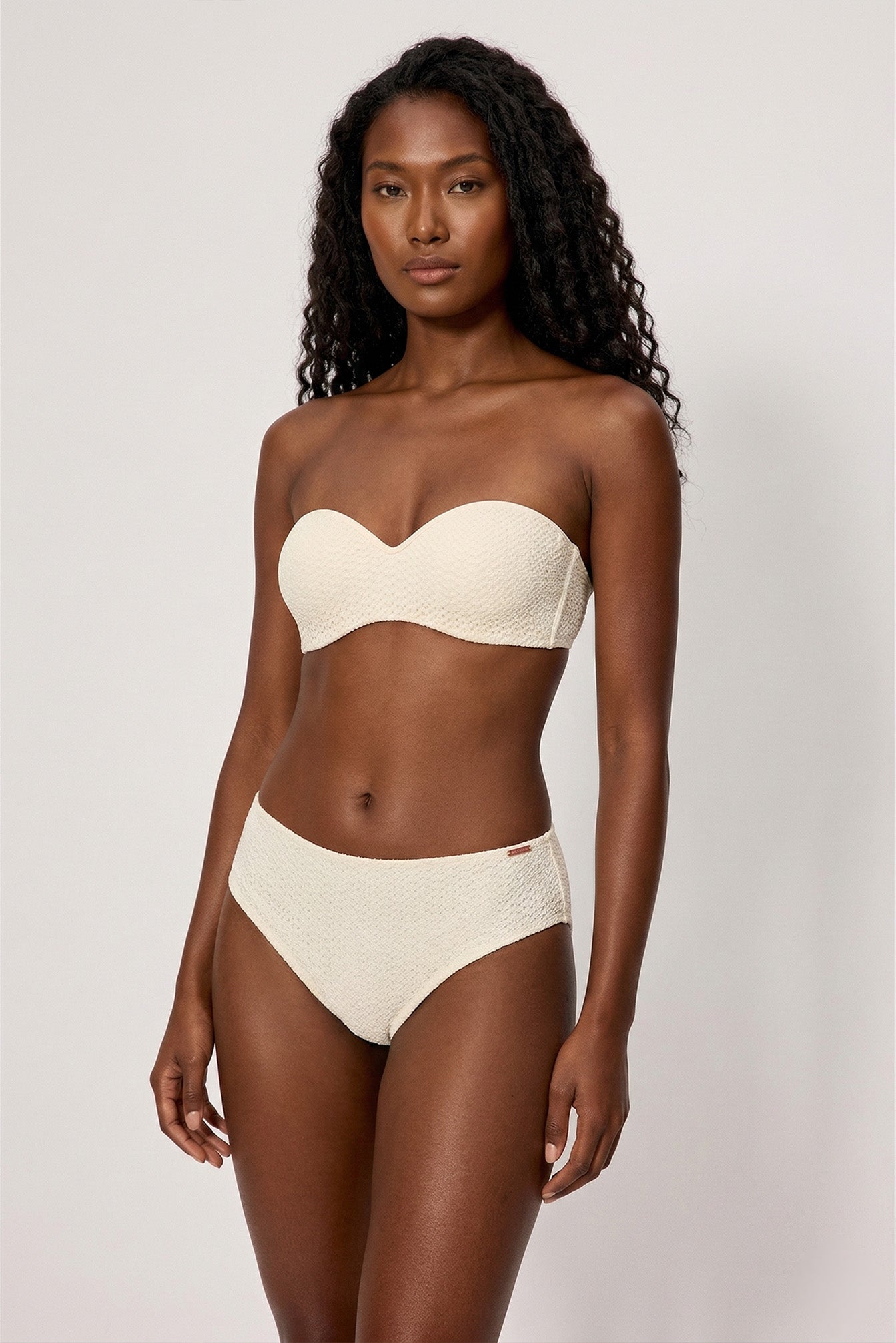Ivory openwork shaping midi bikini briefs in a soft fabric